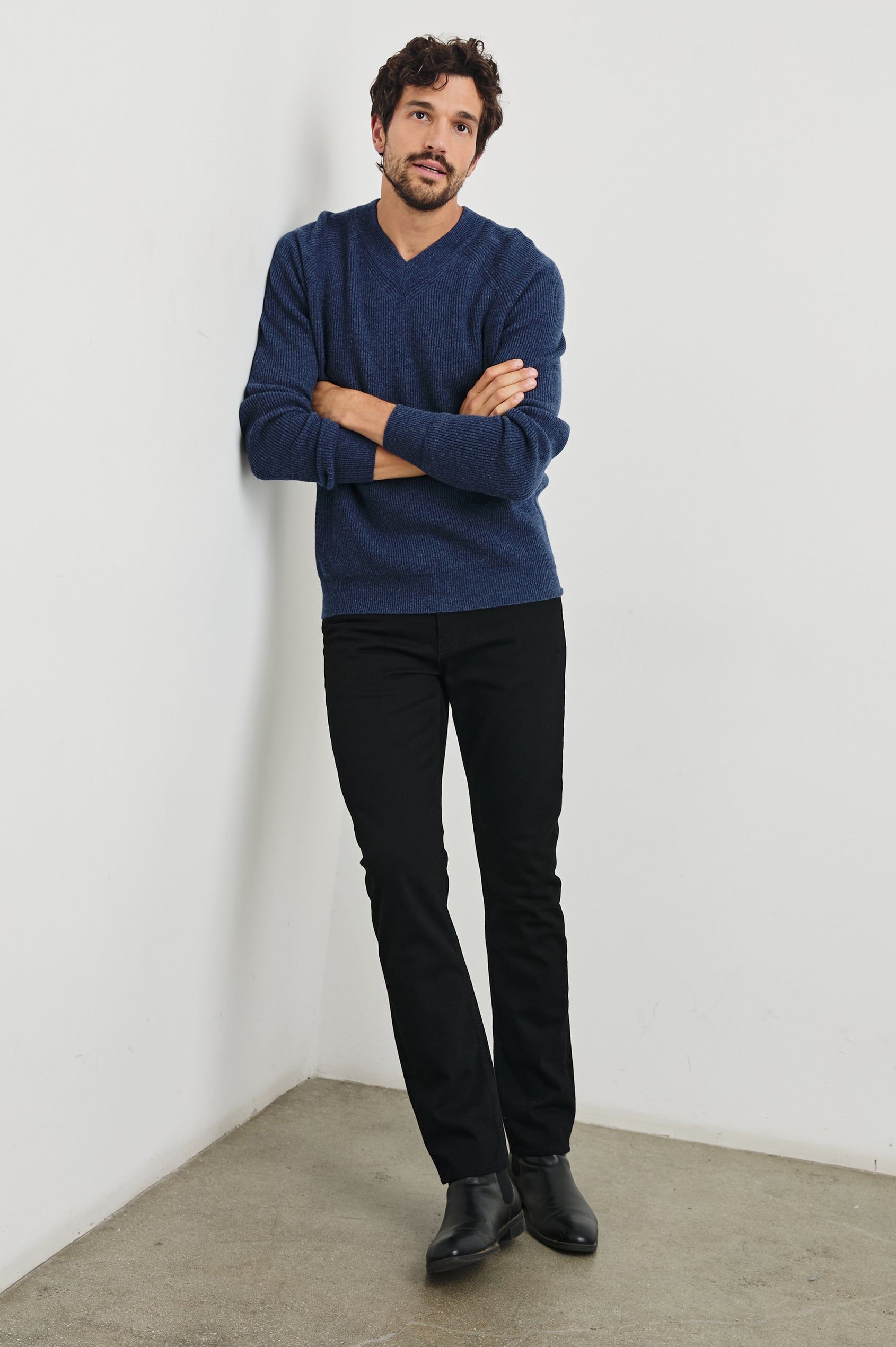 Ansel Long-Sleeve Ribbed Sweater with a V-neck in Blue Melange Colorway - Front Full Body View Featured on Model