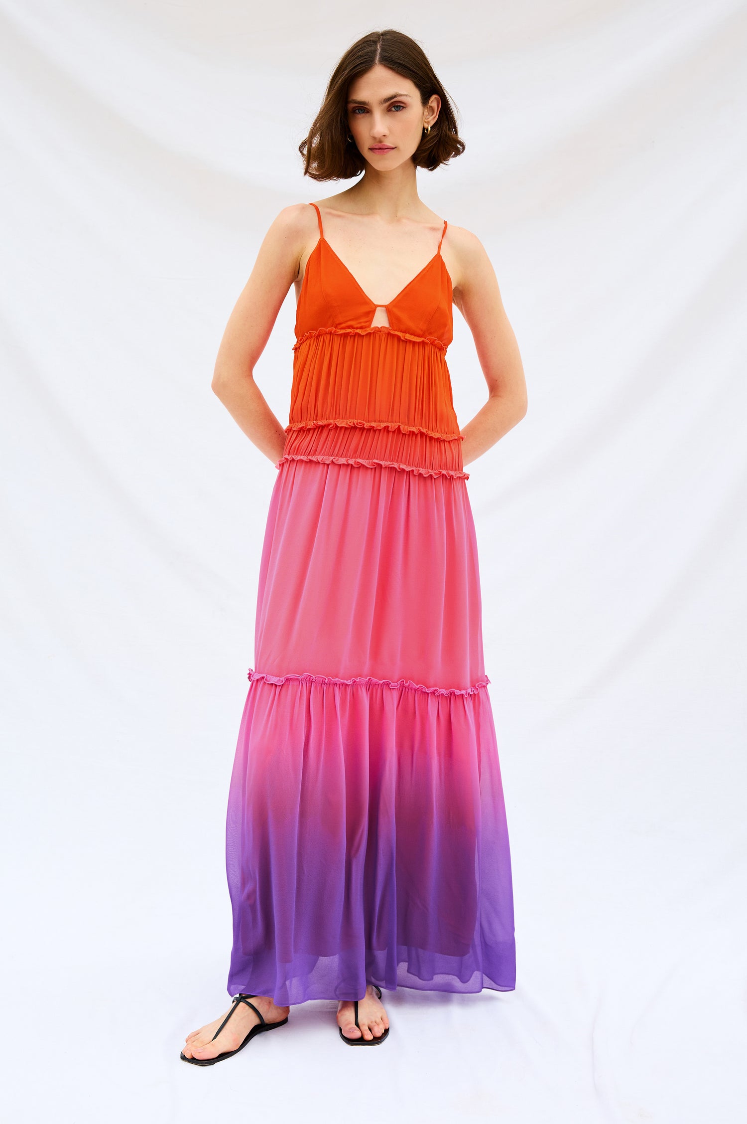 Antonella Maxi Dress with Spaghetti Straps, V-Neck, Keyhole at Center Front, Tiered Skirt with Exposed Raw Ends in Violet Dip Dye Colorway. Stylized Full Body Front View Shown on Model.