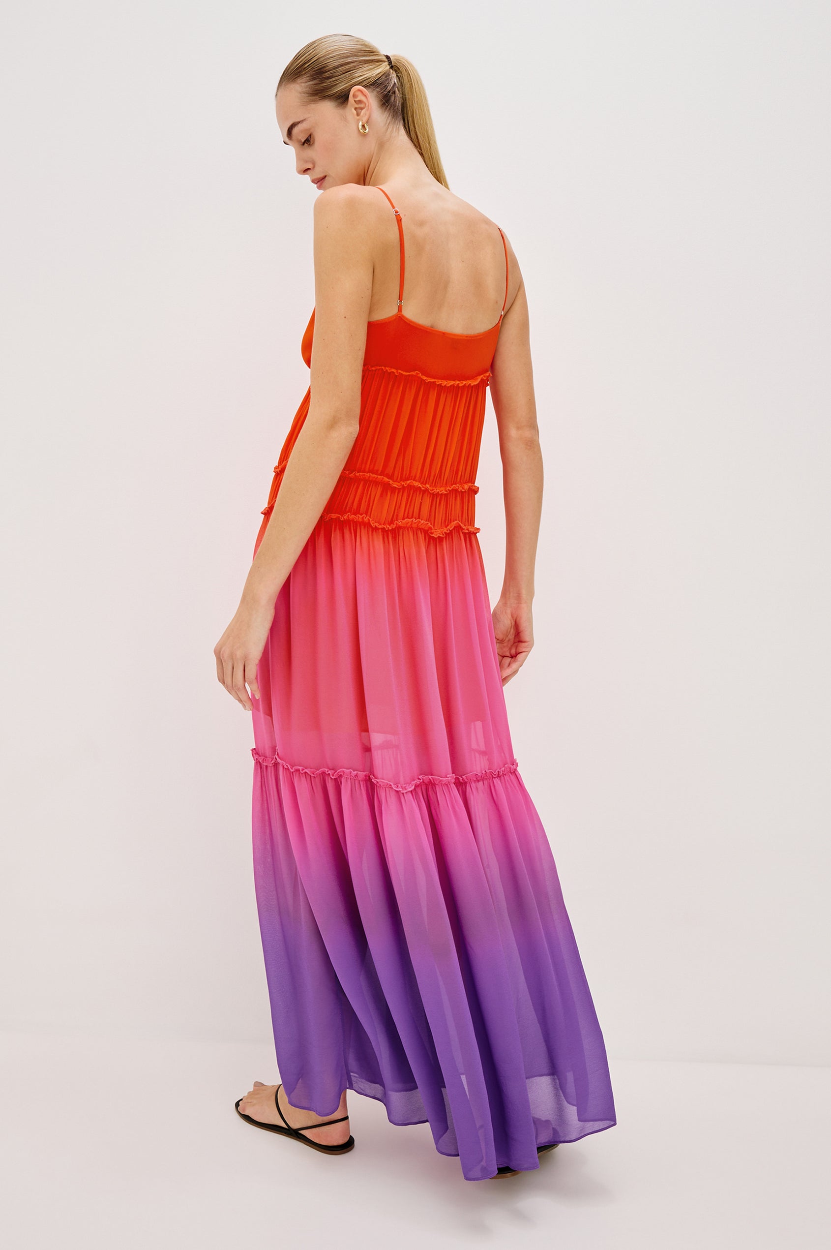 Antonella Maxi Dress with Spaghetti Straps, V-Neck, Keyhole at Center Front, Tiered Skirt with Exposed Raw Ends in Violet Dip Dye Colorway. Full Body Back View Shown on Model.