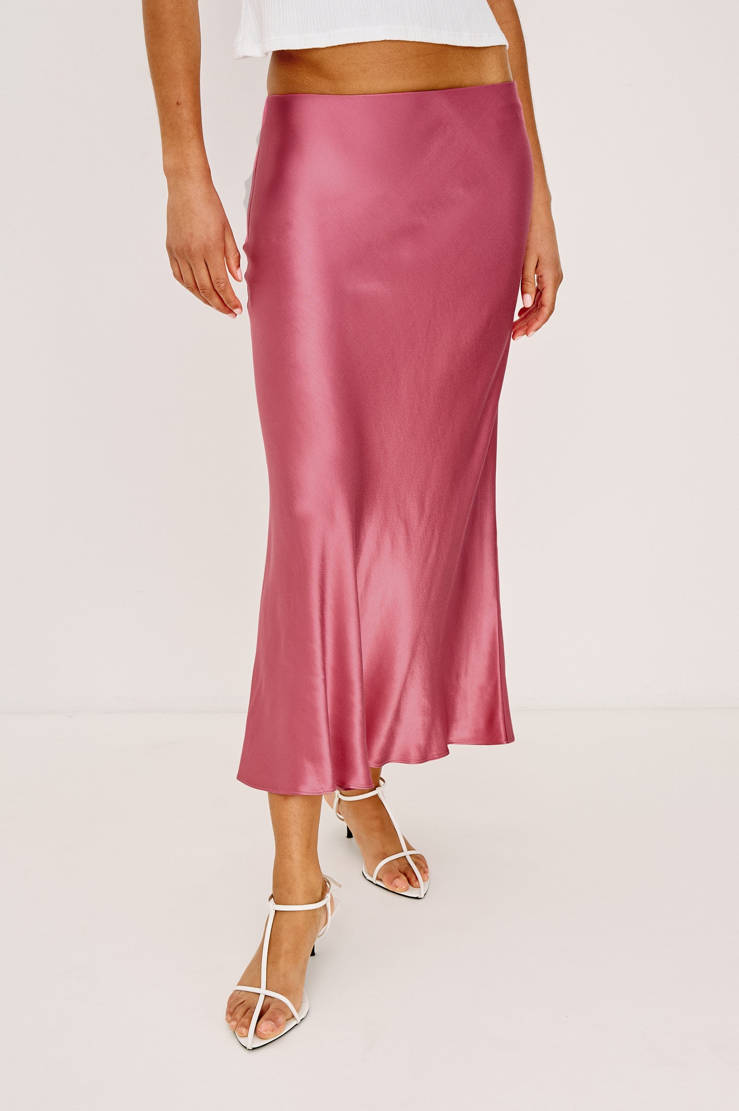 Anya High-Waisted Midi Skirt in Satin Crepe With Side Slit in Dark Rose Colorway - Lower Body Front View Featured on Model
