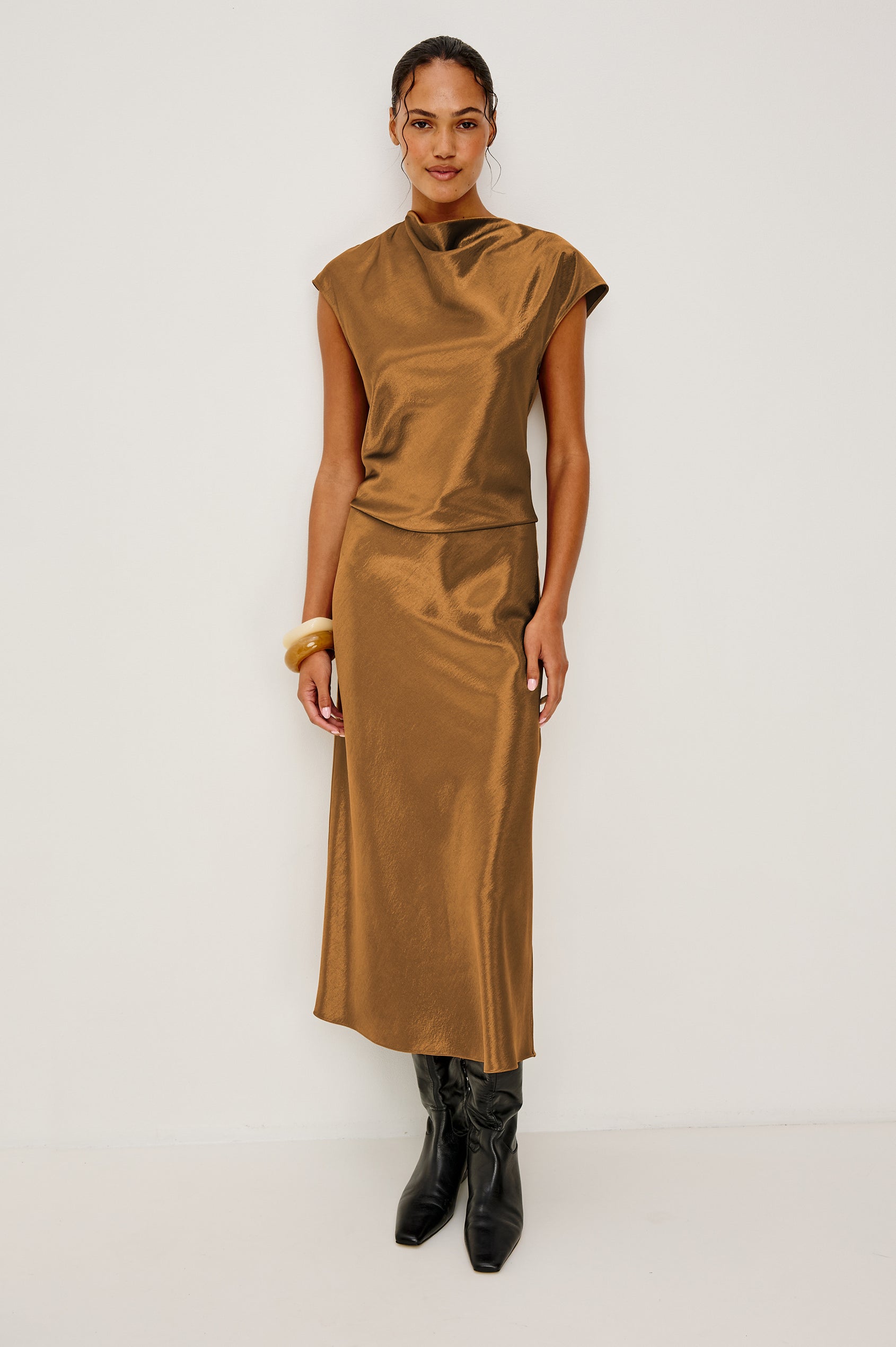 Anya High-waisted Midi Skirt in Espresso Brown Colorway - Front View Featured on Model, lower half of body