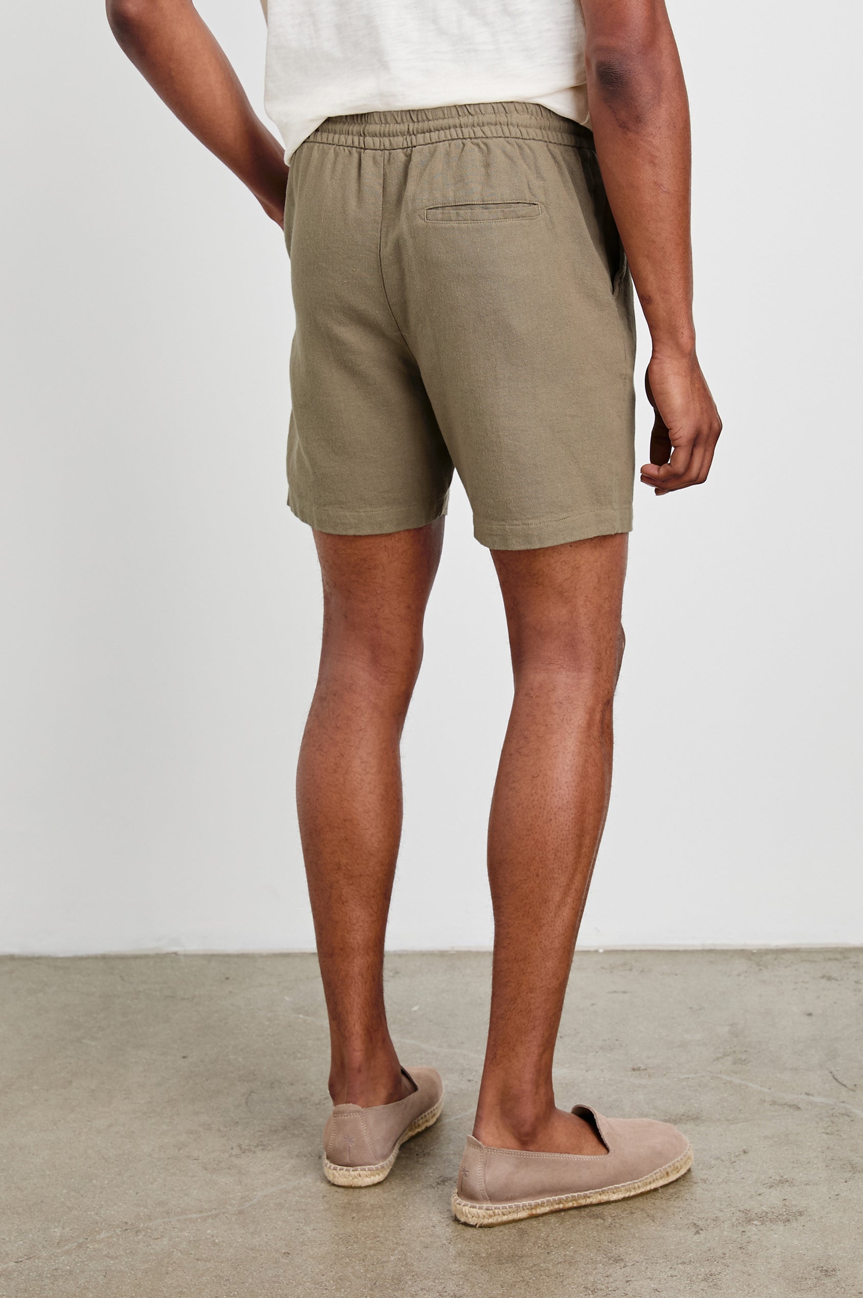 Archer 6" Shorts with a Drawstring Waist, Zipper Fly with Button, Two Front Pockets and a Back Patch Pocket in Barley Colorway - Back View Featured on Model