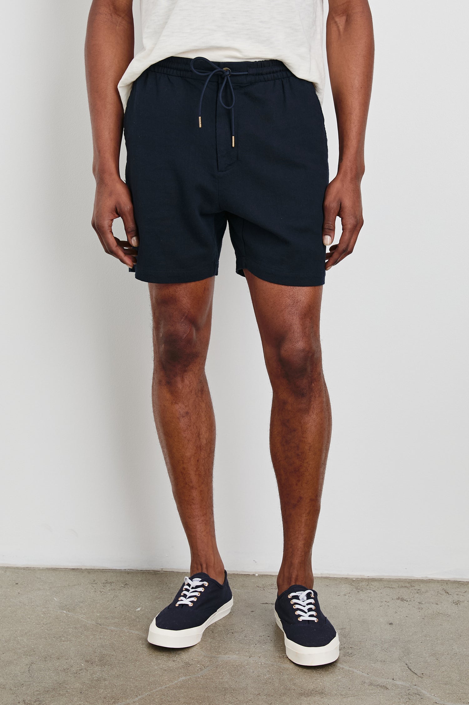 Archer Short in Cotton-Linen Blend With Relaxed Fit, Elastic Drawstring Waist, Front Zip Fly, Side Pockets, and Back Welt Pocket in Deep Meridian Colorway - Full Body Front View Featured on Model