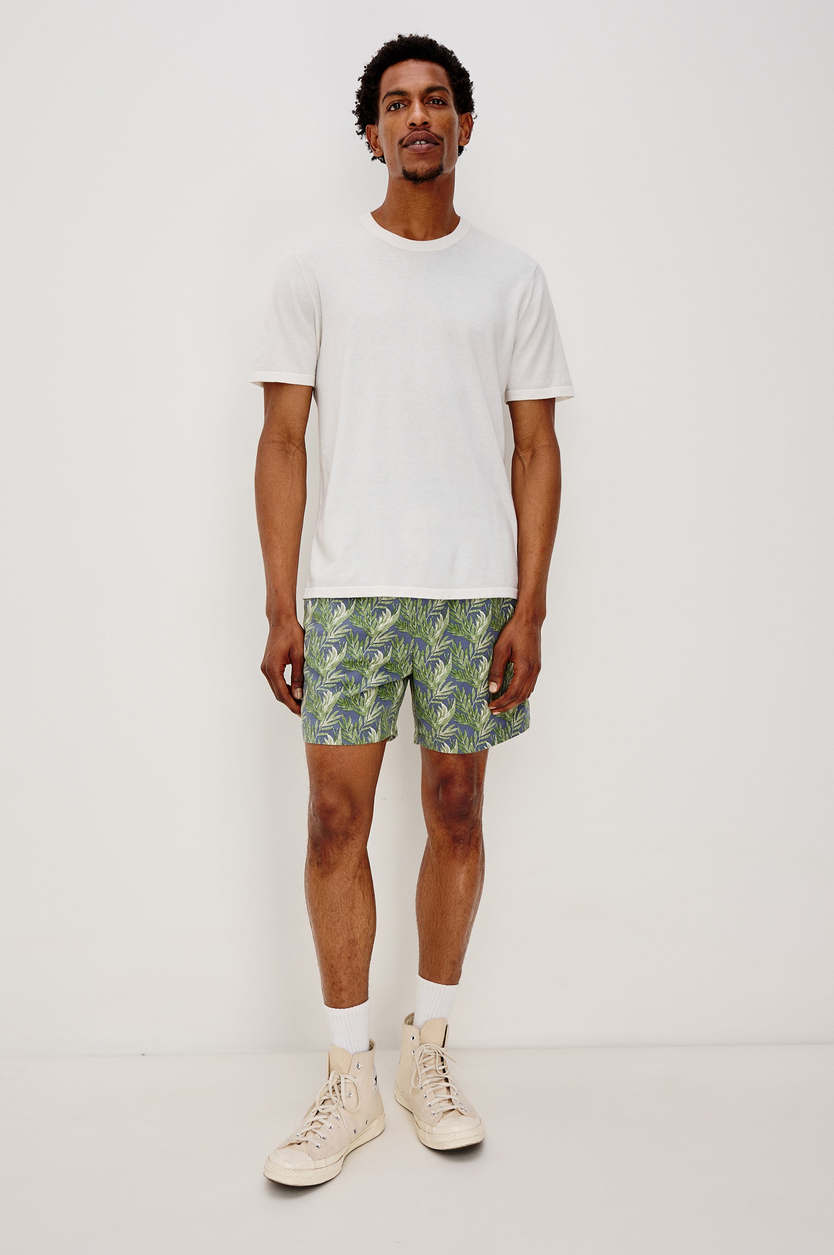 Aries mid length linen short with Side Pockets and a drawstring at waistband in Slate Seaweed Print Patter - full body front view on model.
