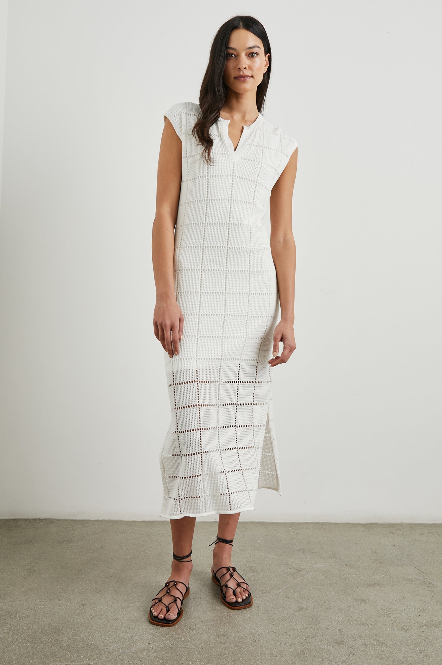 Ashley Short-Sleeve, Open Knit Midi Dress with Cap Sleeves, a V Neck Placket and a Side Slit in White Colorway - Front Full Body View Featured on Model 