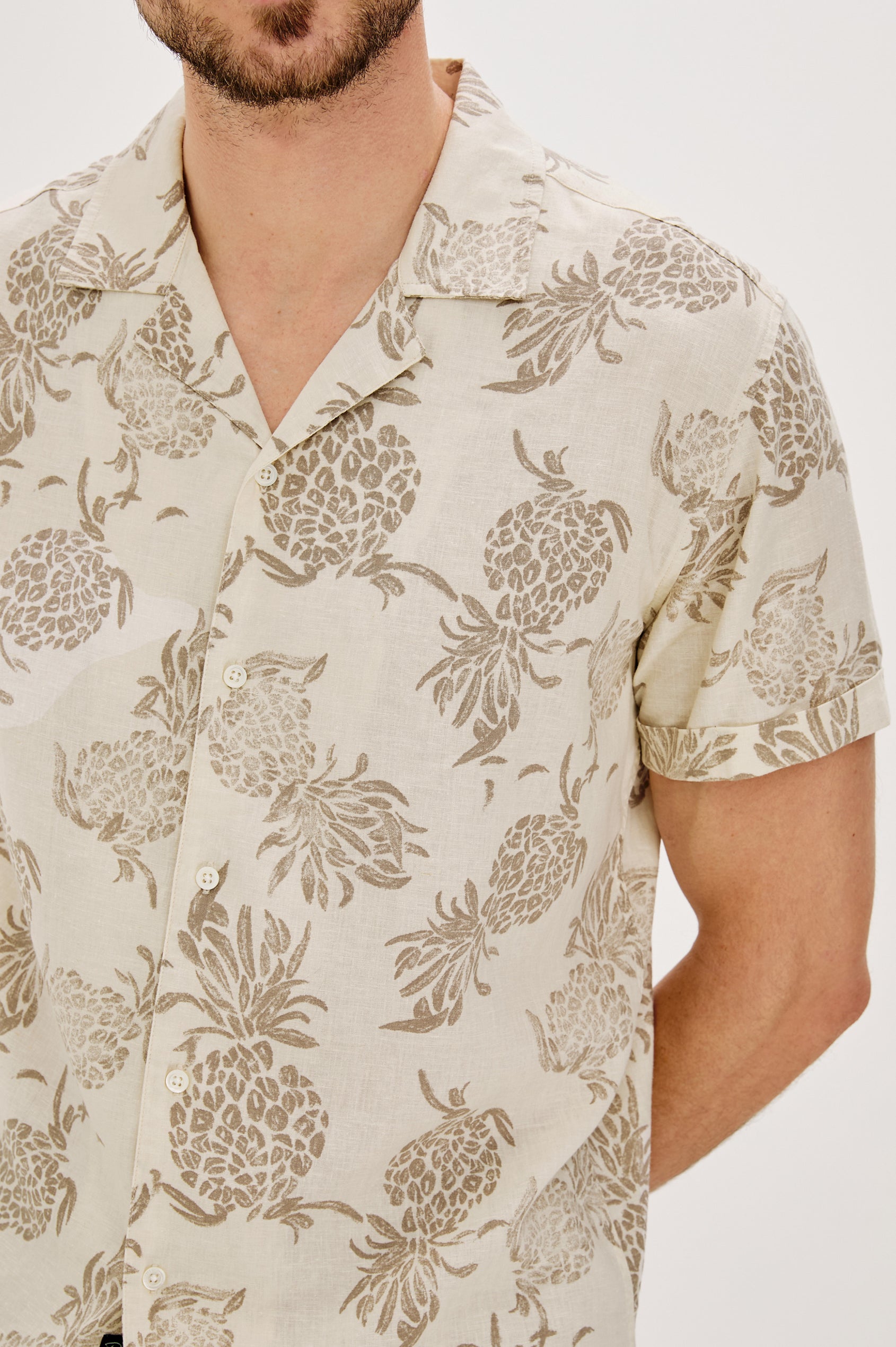 Atlas Printed Button Front Shirt with Short Sleeves, Flat Collar and Lapel in Pineapple Block Ecru Colorway. Front Detail View Shown on Model.