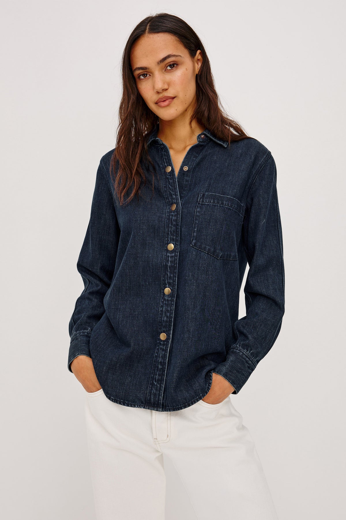 Atticus Shirt in TENCEL Denim With Relaxed Fit, Point Collar, Front Button, and Long Sleeves With Flat-Felled Seams and Buttoned Cuffs in Blue Ridge Colorway - Upper Body Front View Featured on Model