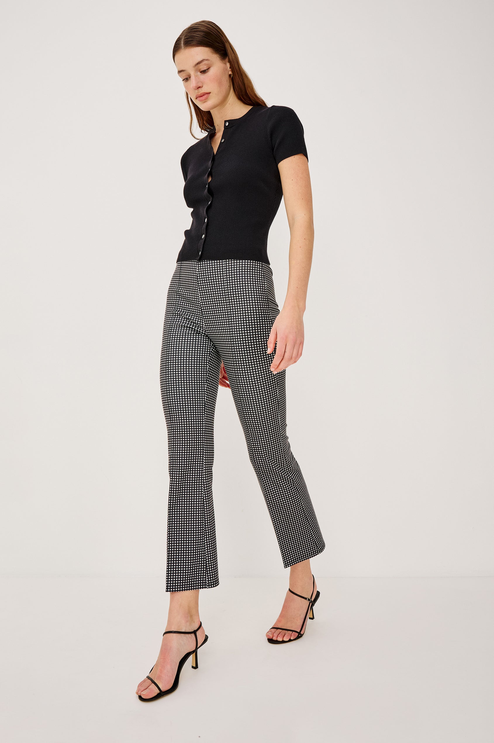 Auray High-Waisted Pant in Ponte With Pintuck Front Seams Cropped Legs Elastic Waistband and Kick Flare in Black Colorway - Full Body Front View Featured on Model