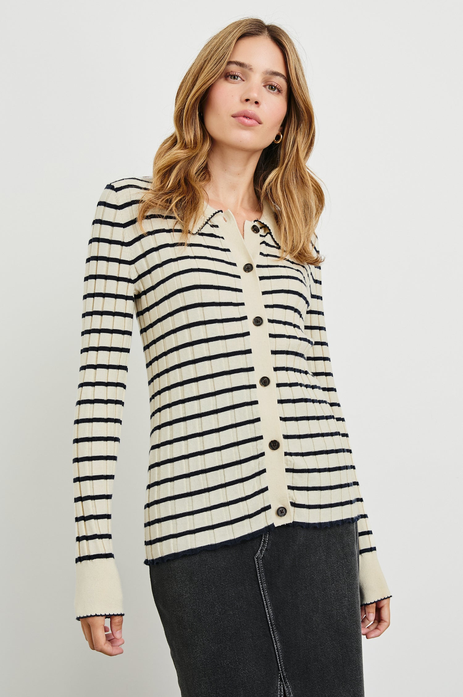 Aurelia Long-Sleeve, Wide Ribbed Top with Buttons Down the Front, a Collar and  Scalloped Stitching at the Collar and Cuffs in Ivory Navy Stripe Colorway - Horizontal Stripes - Front View Featured on Model 
