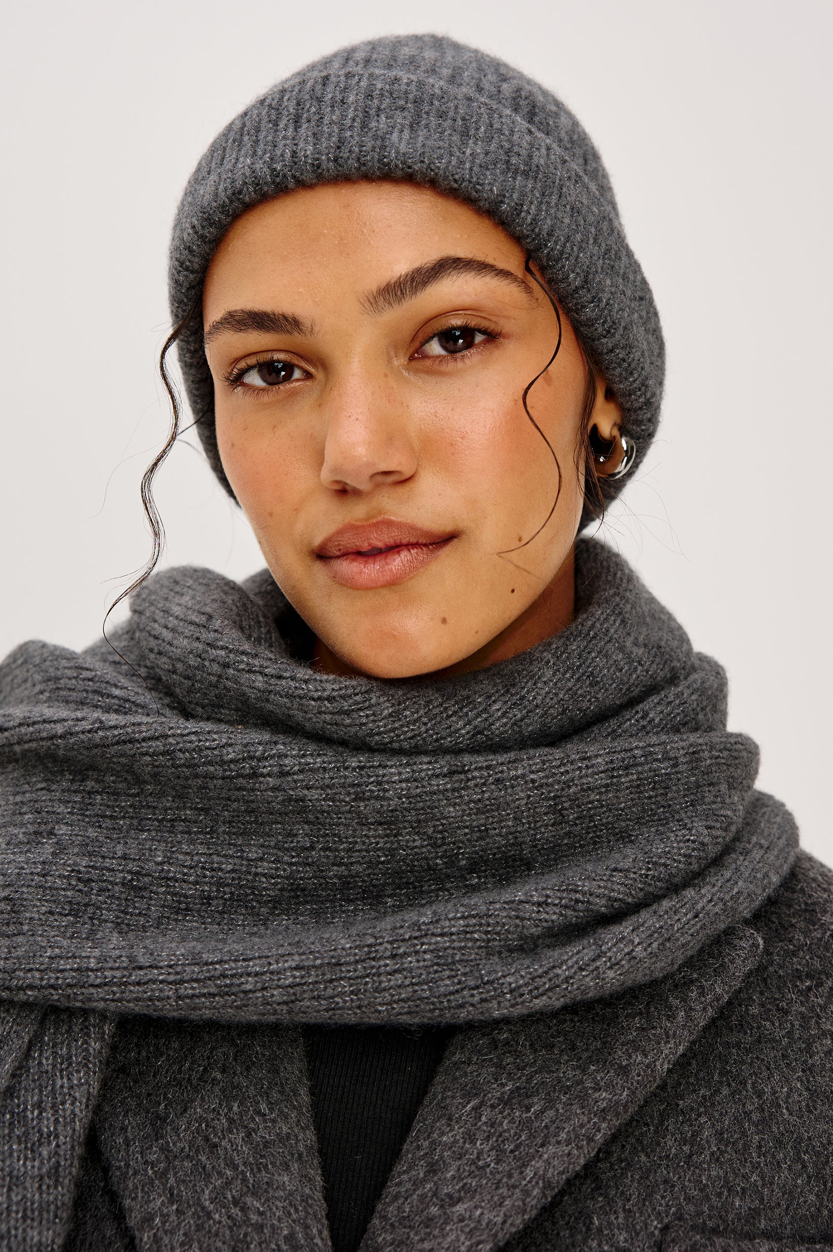 Autumn Cashmere Silk Cuffed Beanie in Thunder Colorway. Front view featured on model.