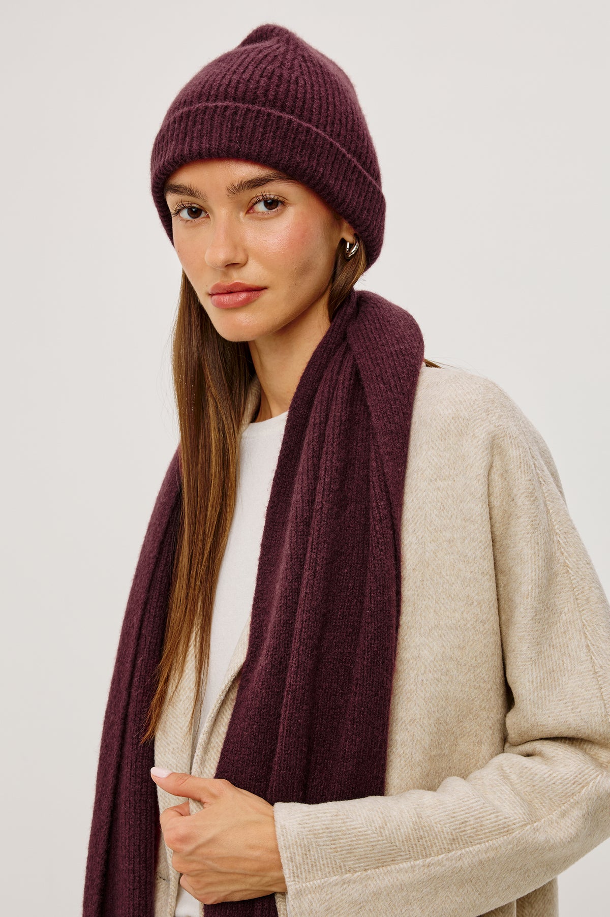 Autumn Beanie in Ribbed Silk Cashmere Blend in Wine Colorway - Upper Body Front View Featured on Model