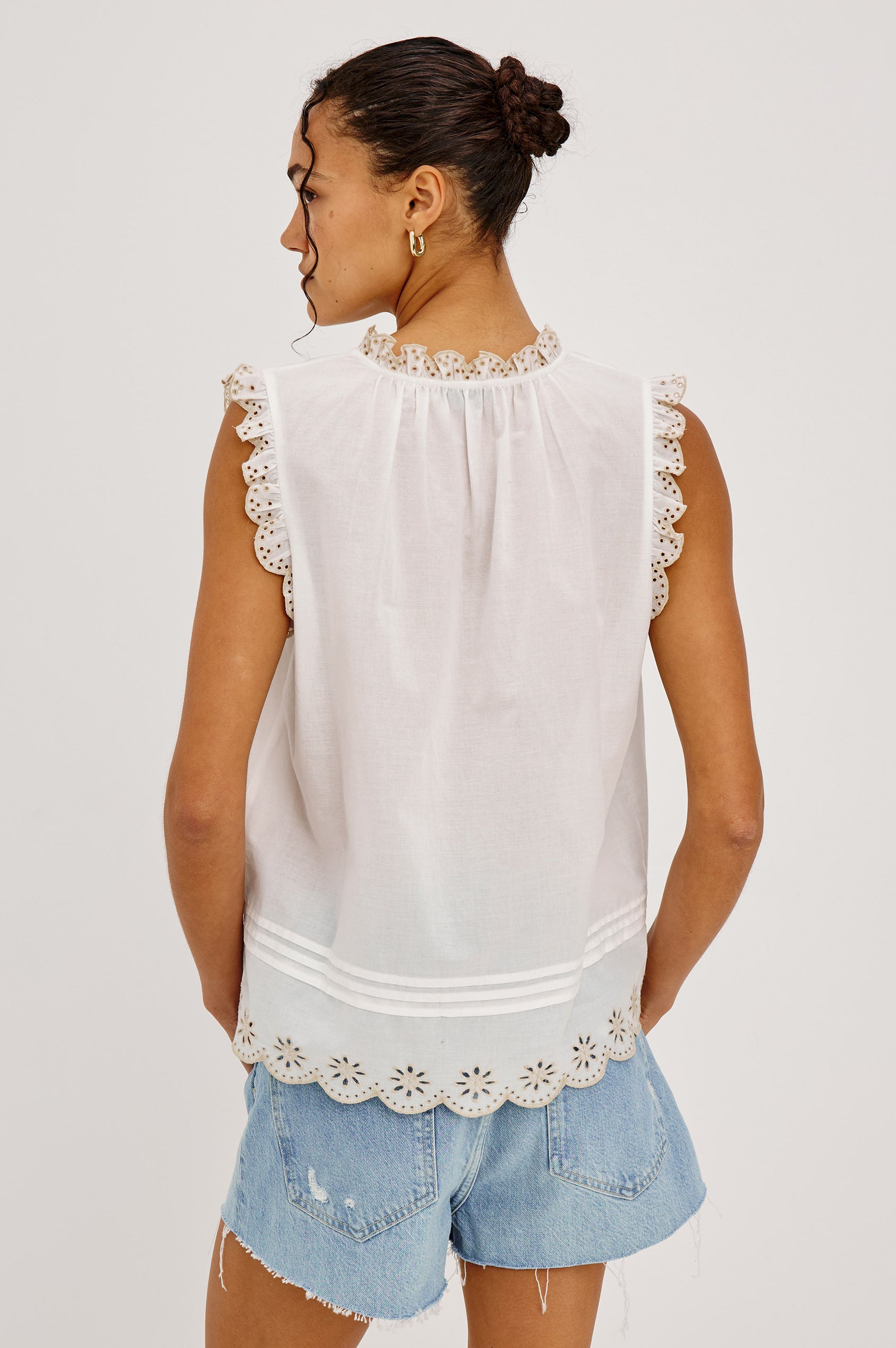 Avery Sleeveless Top in Cotton Voile With Scalloped Embroidered Trim, Front Buttons, and Relaxed Fit in White Colorway - Upper Body Back View Featured on Model