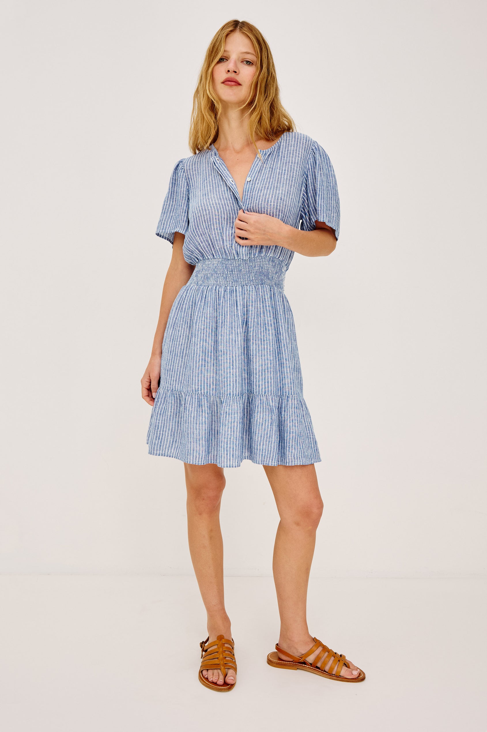 Bea Mini Dress in Lightweight Linen With Half-Placket Neckline, Short Flared Sleeves, Fully Lined Tiered Skirt, and Shirred Waist in Barletta Stripe Colorway - Full Body Front View Featured on Model