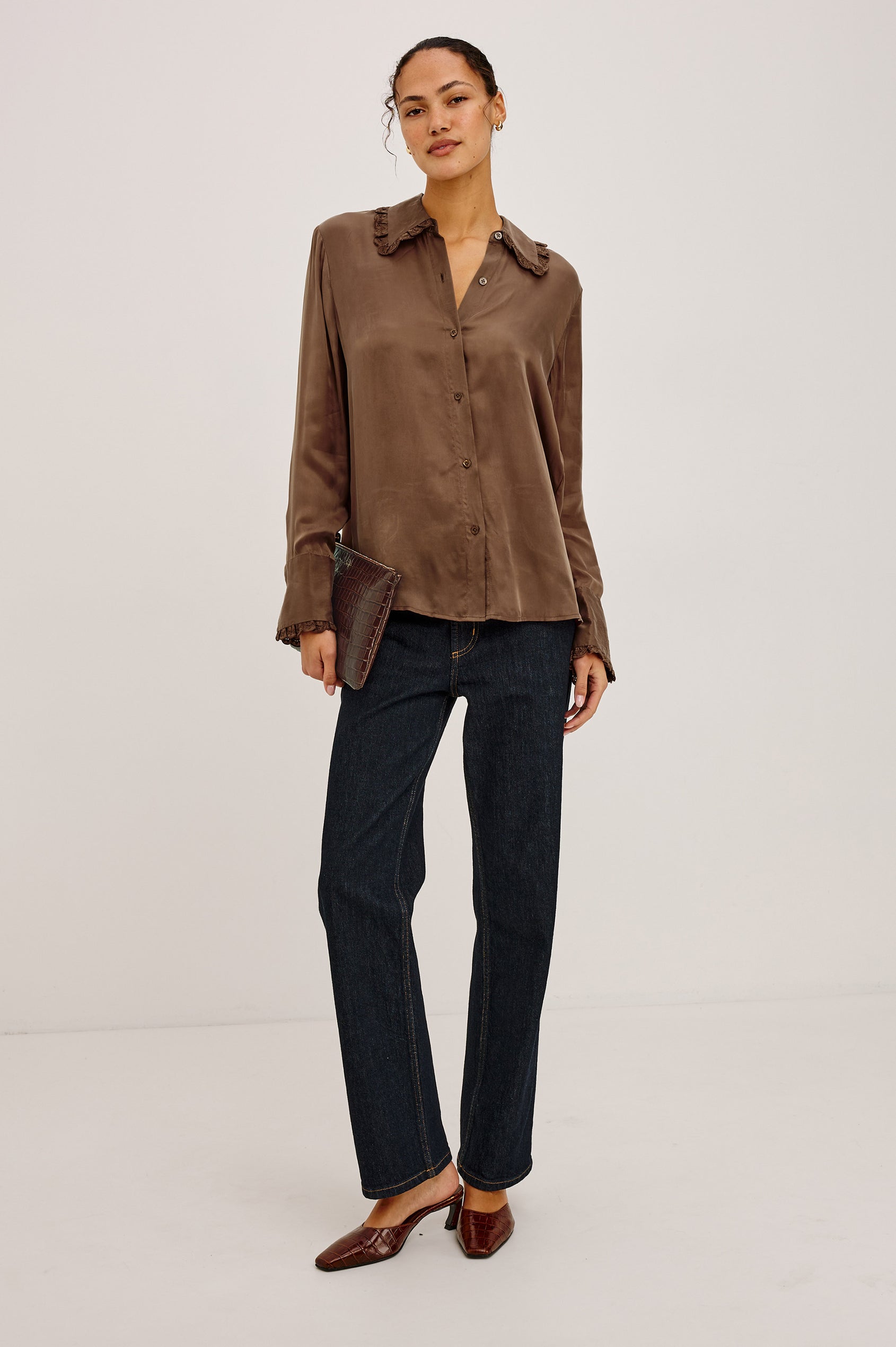 Beatrix Shirt in Smooth Cupro With Point Collar, Eyelet Ruffle Trim, Relaxed Fit, and Long Sleeves in Ivory Colorway - Full Body Front View Featured on Model