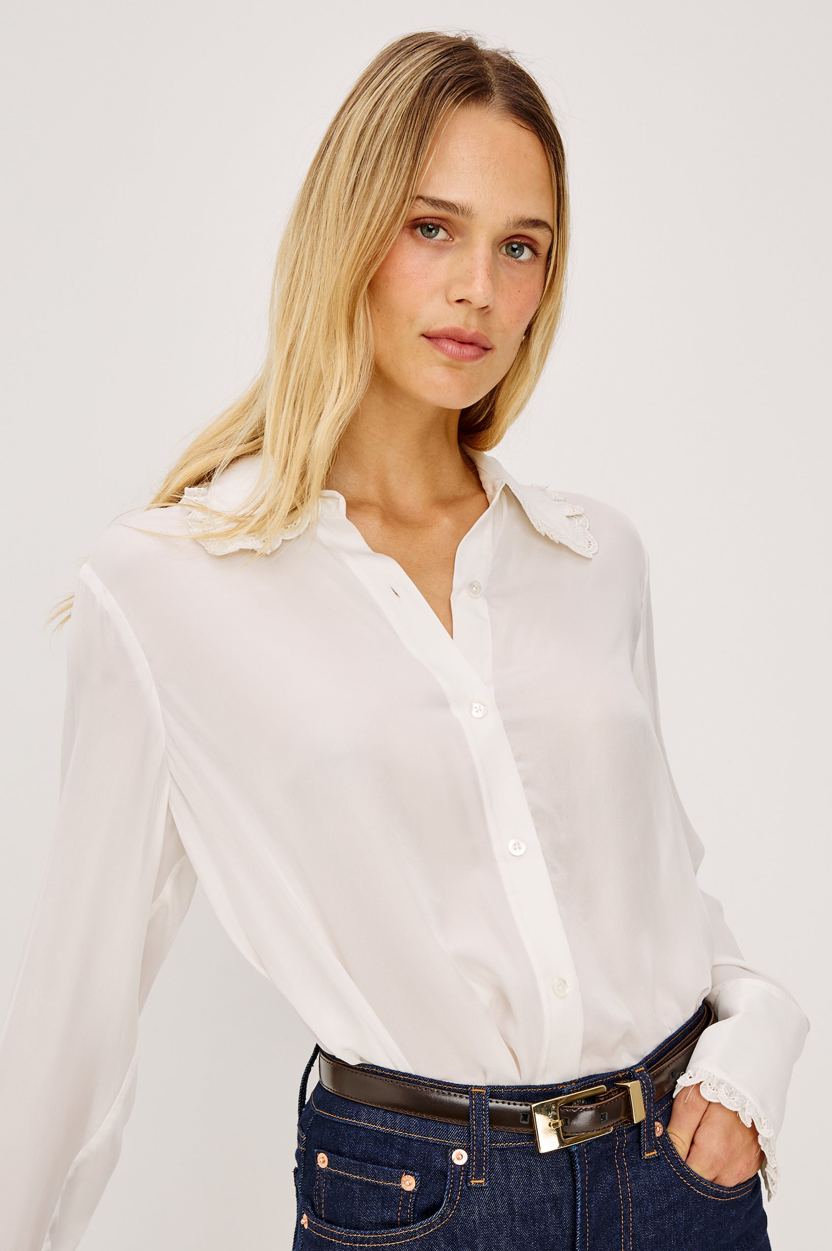 Beatrix Shirt in Smooth Cupro With Point Collar, Eyelet Ruffle Trim, Relaxed Fit, and Long Sleeves in Ivory Colorway - Upper Body Front View Featured on Model