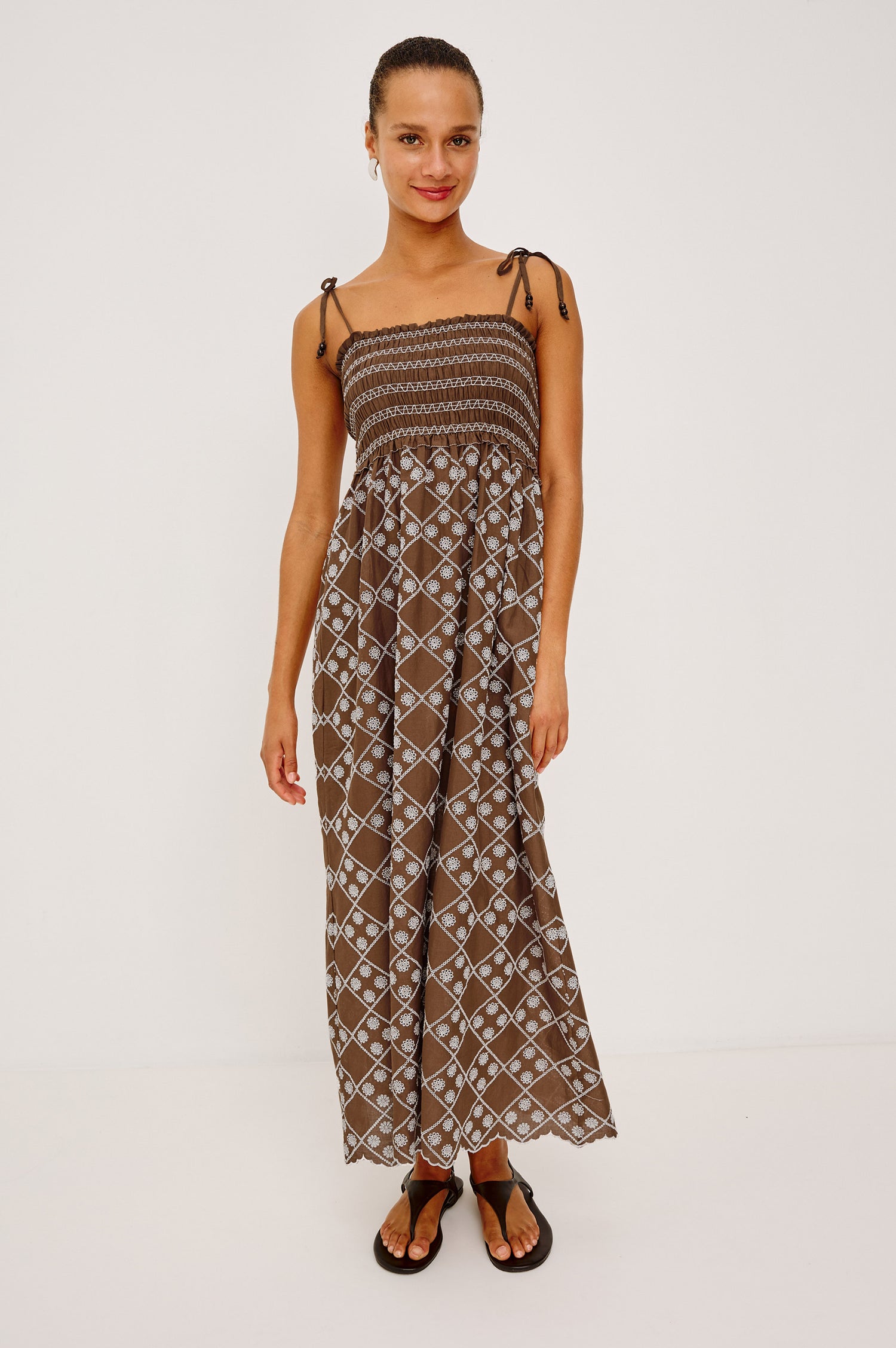 Becca Maxi Dresss in Cotton Voile Wih Beaded Adjustable Shoulder Ties, Straight Neckline, Smocked Bodice, Empire Waist, and Full Skirt in Cocoa Daisy Embroidery - Upper Body Front View Featured on Model