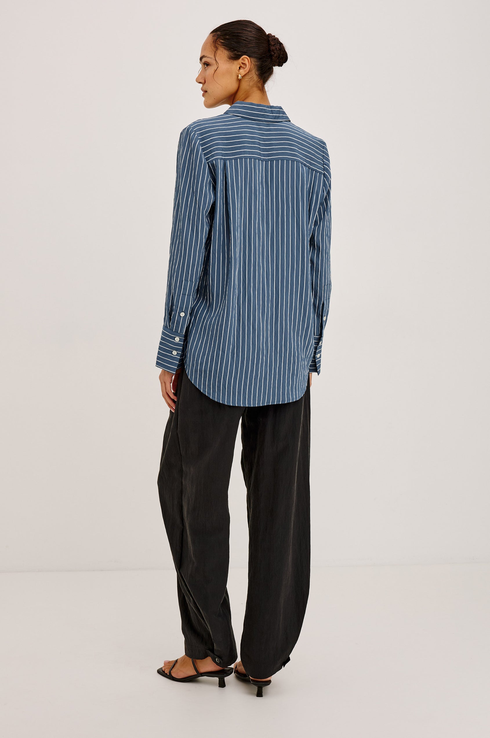 Beck Shirt in Luxe Rayon With Collar, Button Front, Chest Patch Pocket, Long Sleeves, and Relaxed Fit in Washed Indigo Stripe Colorway - Full Body Back View Featured on Model