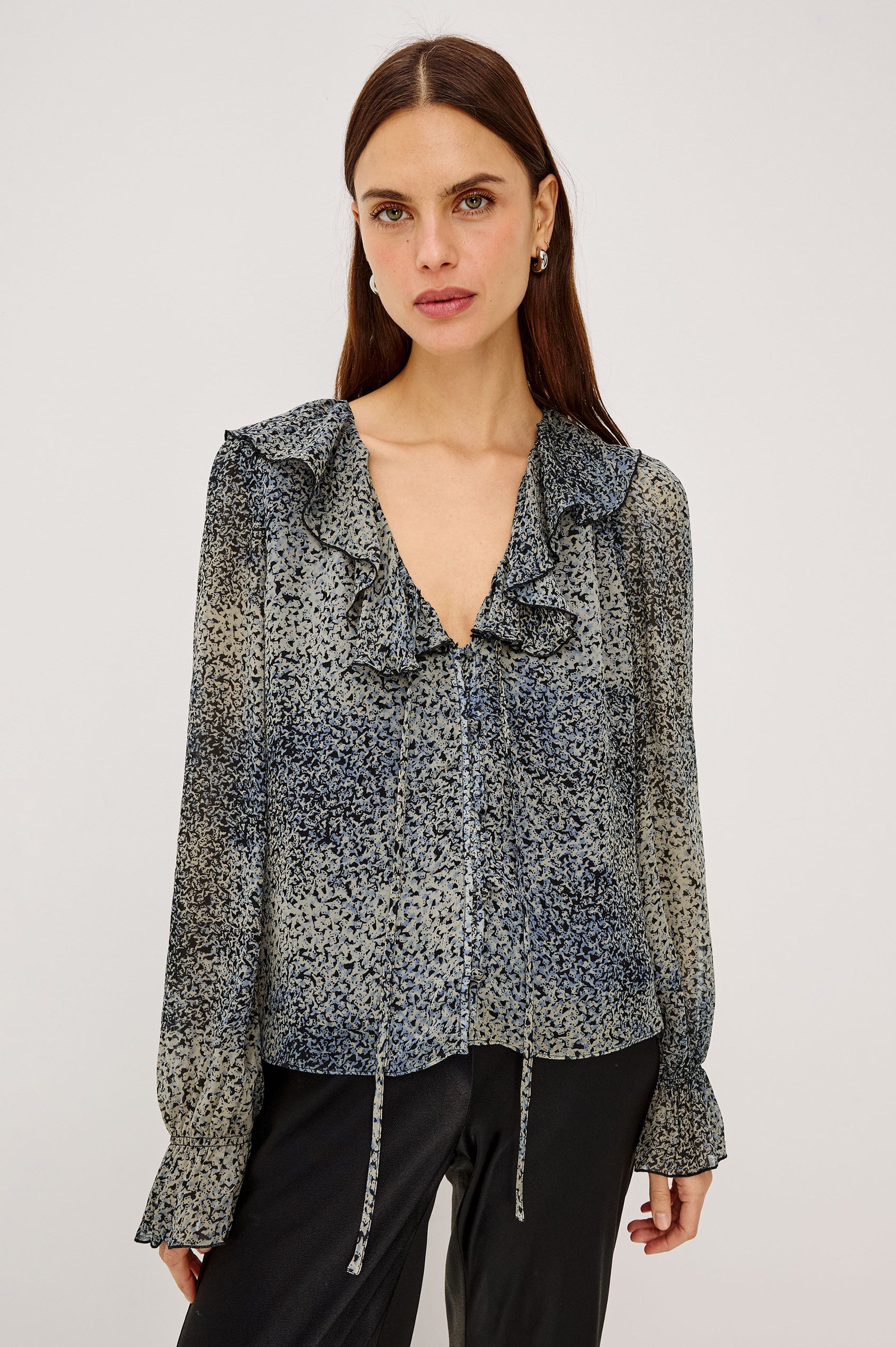 Becky Shirt in Self-Lined Chiffon With Deep V-Neckline, Ruffle Collar, Center Front Self-Tie, Long Sleeves, and Elastic Ruffle Cuffs in Agate Colorway - Upper Body Front View Featured on Model