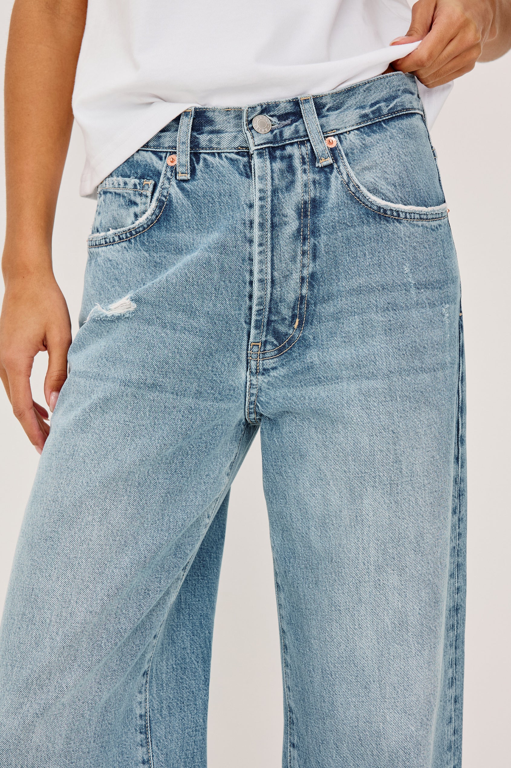 Belmont Arc Leg Jean in Rigid Denim With High-Waisted Fit, Button Fly, and 32″ Inseam in Authentic Stone Colorway - Lower Body Back View Featured on Model