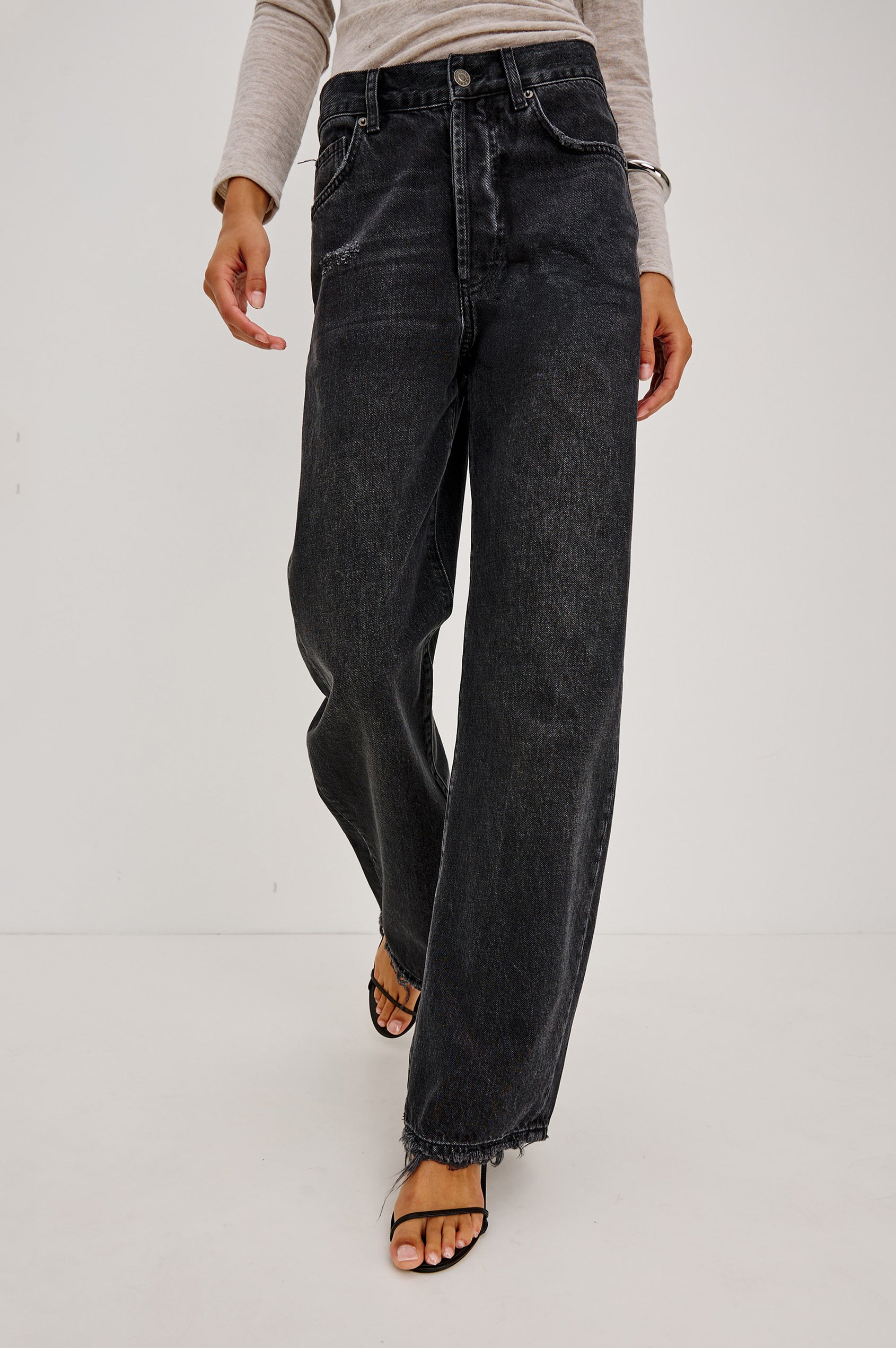 Belmont Petite Arc Leg Jean in Rigid Denim With High Rise, Distressed Detailing, Button Fly, and 5-Pockets in Nightcap Colorway - Lower Body Front View Featured on Model