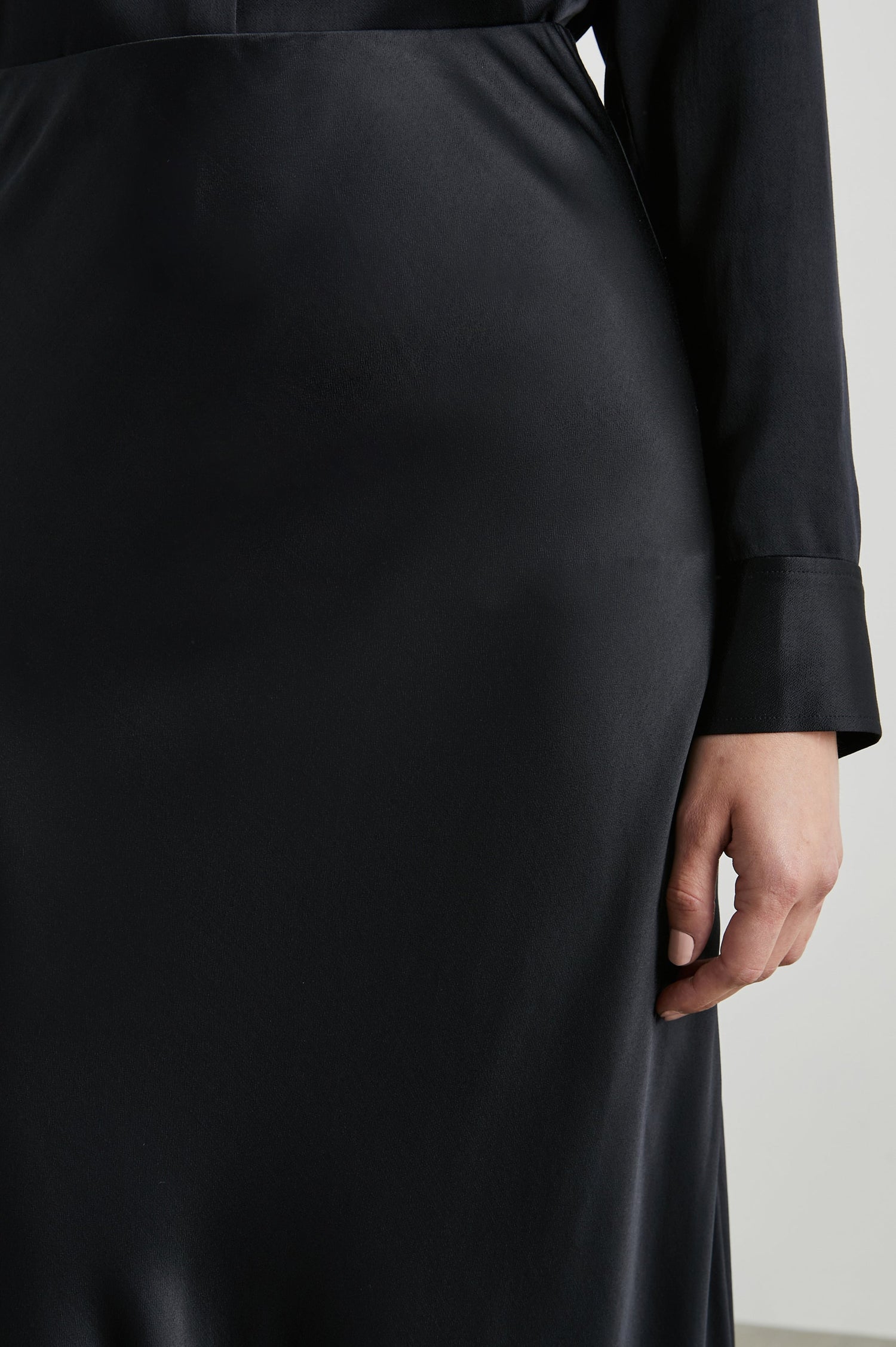 Berlin Midi Skirt in Black Colorway - Front View Featured on Model