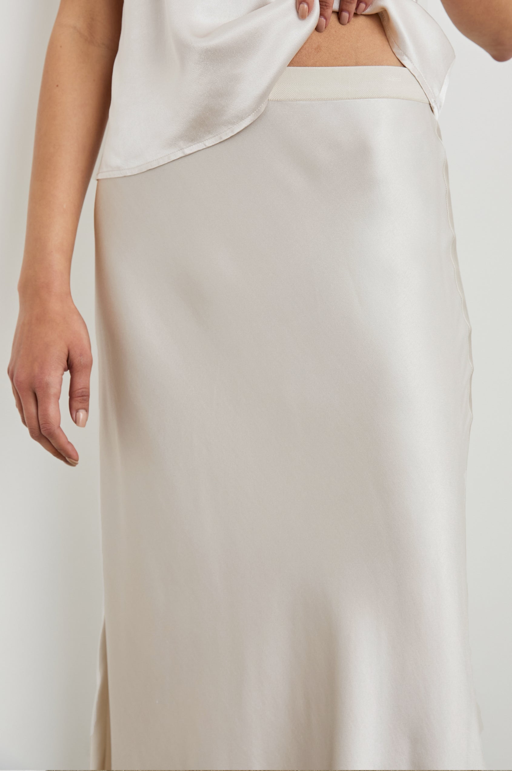 Berlin Midi Skirt in Ivory Colorway - Front View Featured on Model