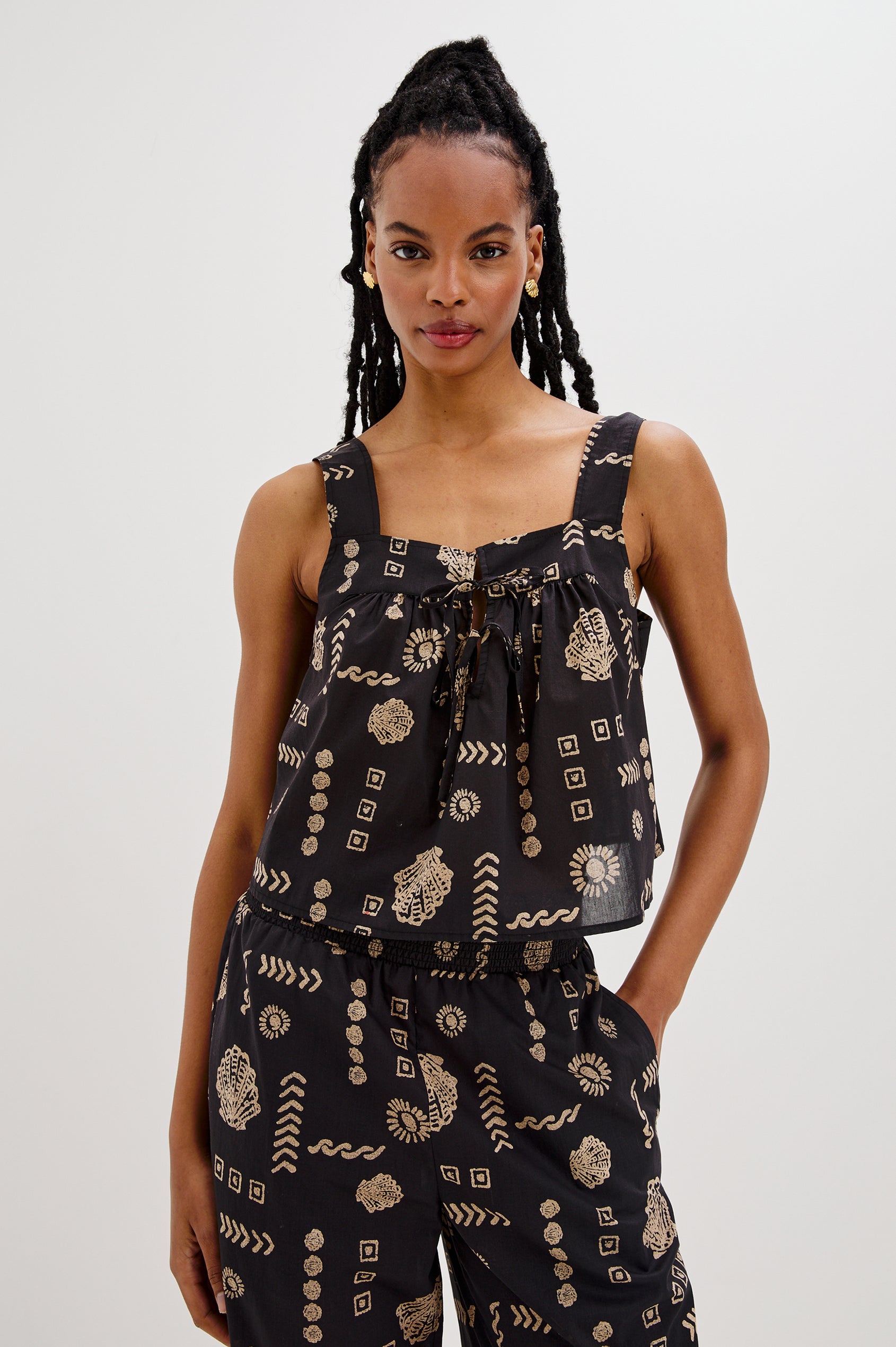 Blythe Square Neck Tank Top with Wide Straps and Two Front Ties in Beach Shells Colorway. Front View Shown on Model.