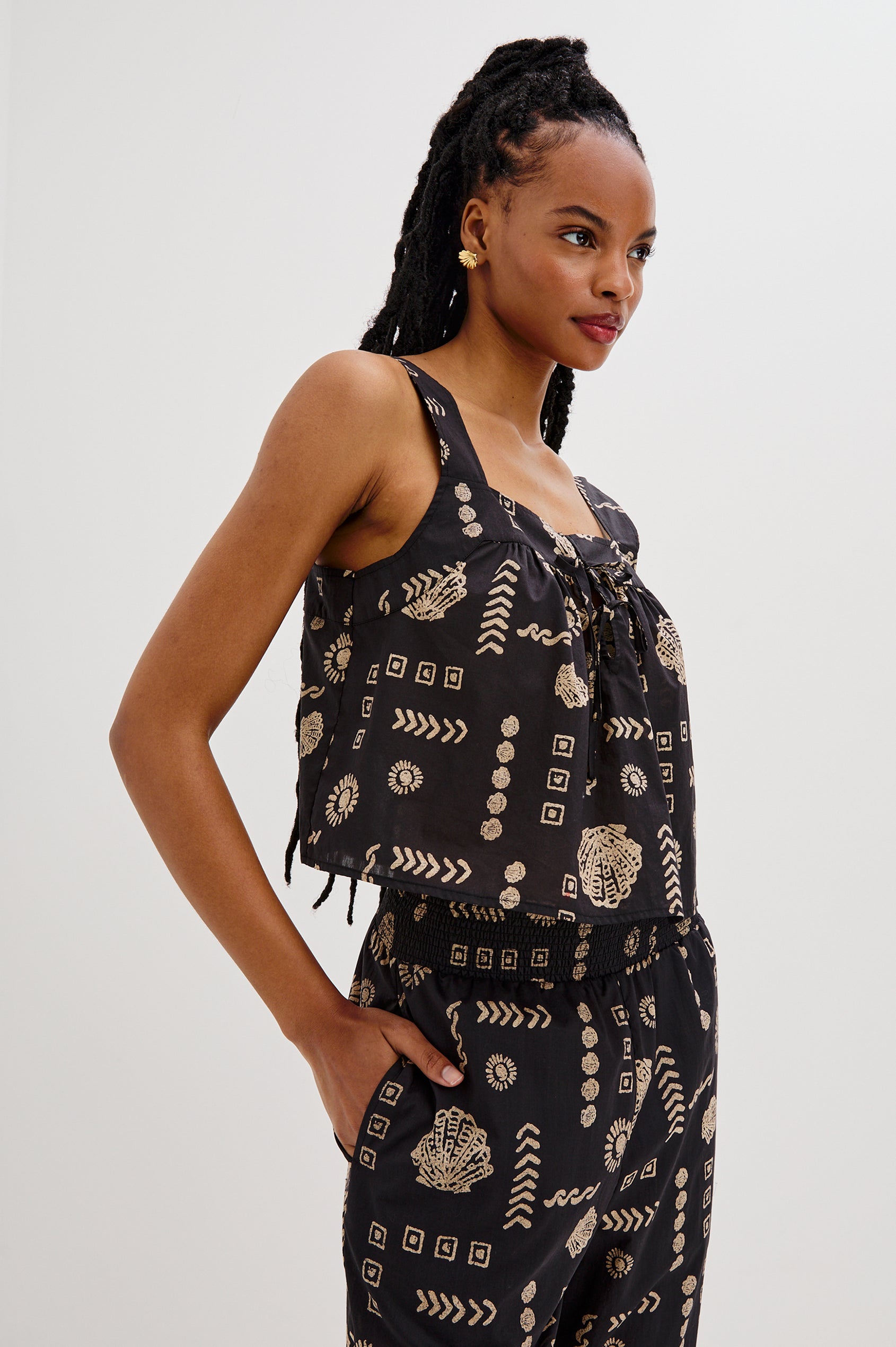 Blythe Square Neck Tank Top with Wide Straps and Two Front Ties in Beach Shells Colorway. Front and Side View Shown on Model.