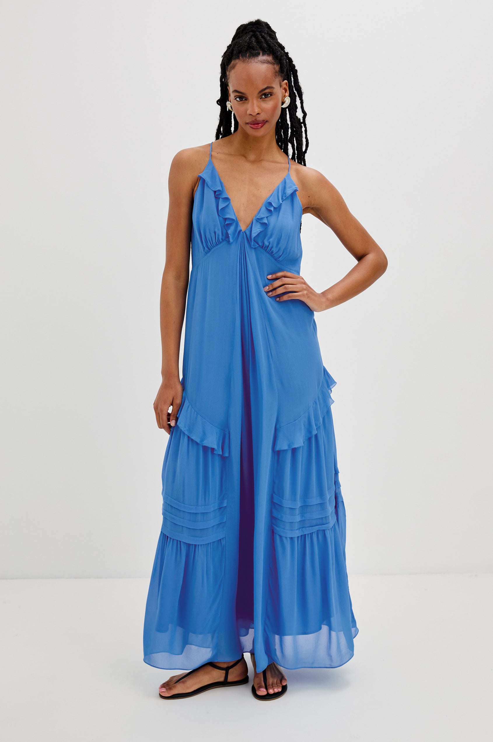 Boa Maxi Tank Dress with Spaghetti Straps, a V-Neck and Ruffle Details in French Blue Colorway. Full Body Front View Shown on Model.