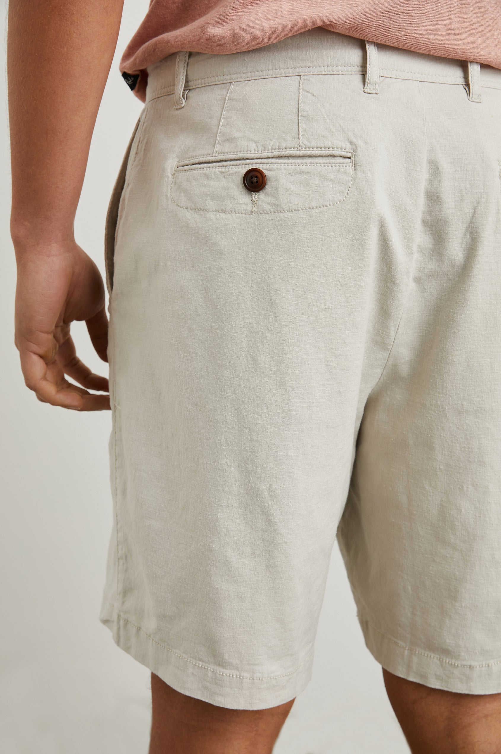 Boden Knee-Length Shorts with Belt Loops, Two Front Pockets and Two Back Button Welt Pockets in Stone Colorway - Back View Featured on Model