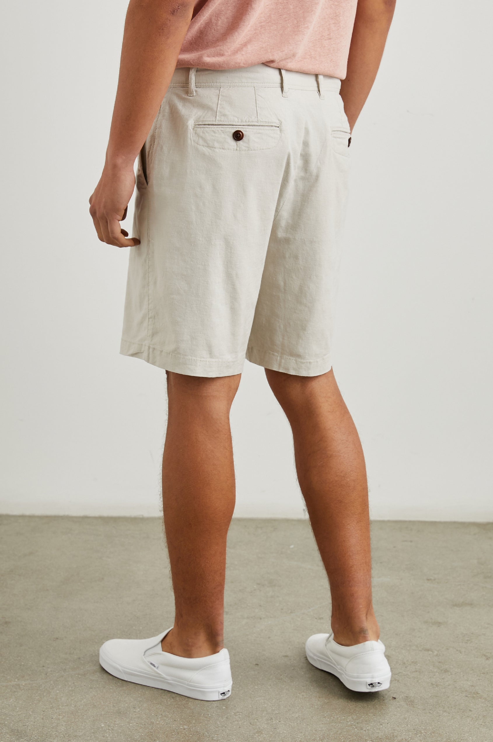 Boden Knee-Length Shorts with Belt Loops, Two Front Pockets and Two Back Button Welt Pockets in Stone Colorway - Back View Featured on Model