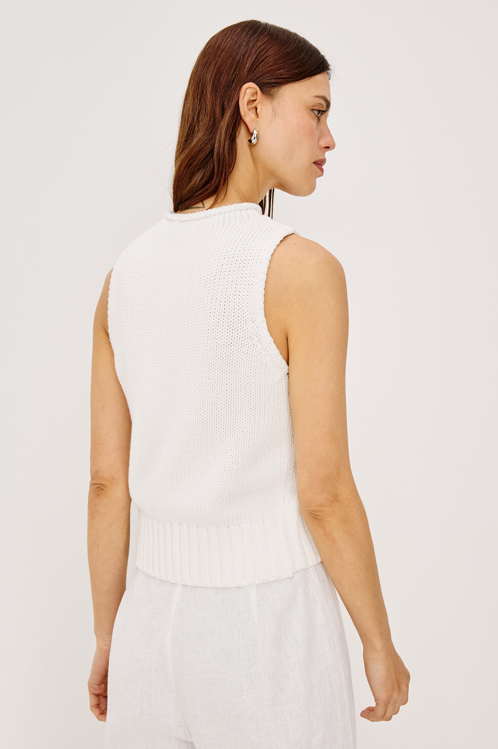 Bondi Sleeveless Vest in Soft Cotton Knit With Rolled Neckline, Relaxed Fit, and Ribbed Hem in White Colorway - Upper Body Back View Featured on Model