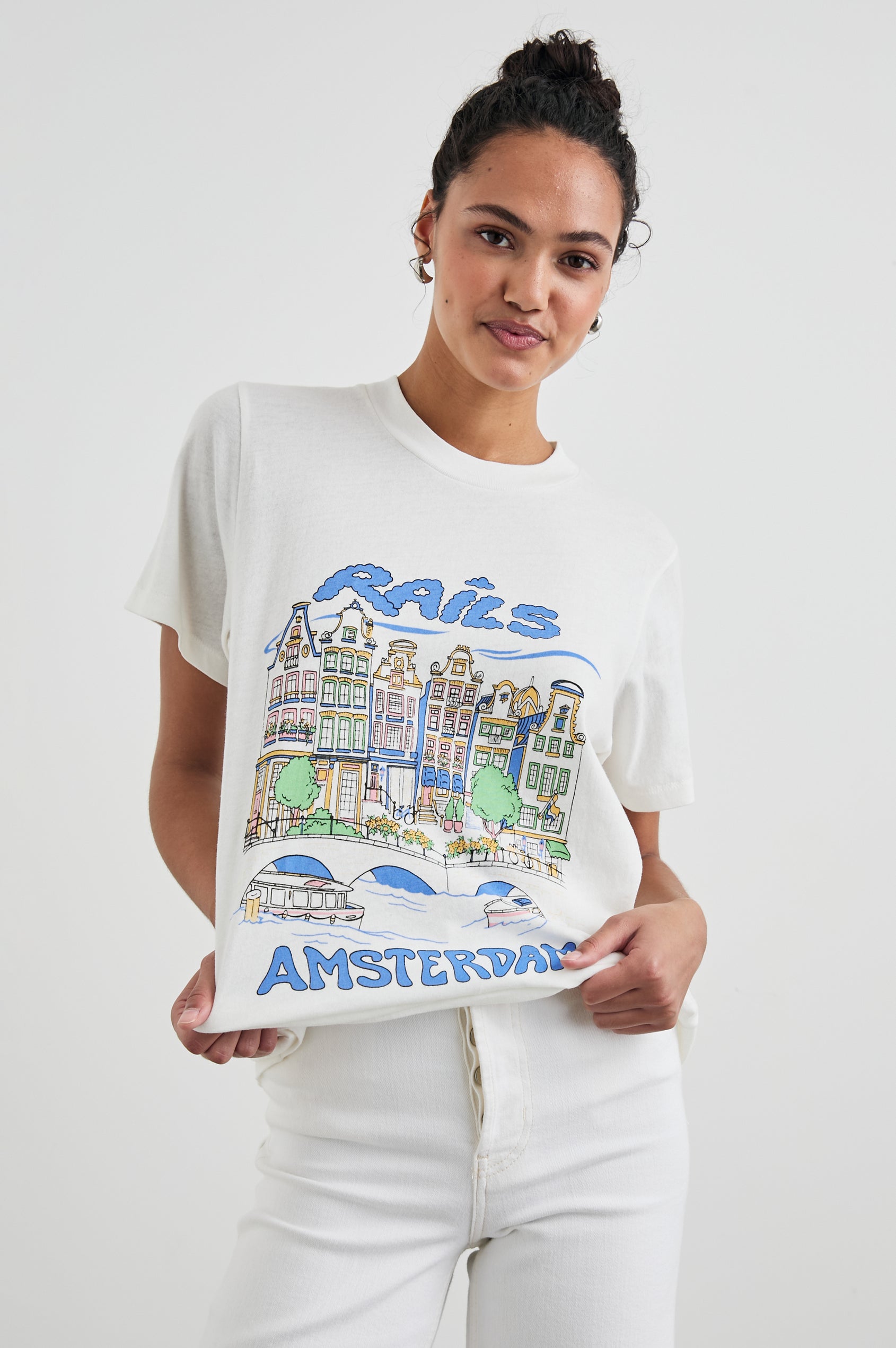 Boyfriend T-Shirt with a Crew Neck, Amsterdam images, and the text, Rails Amsterdam in Rails Amsterdam Colorway, with image and text in blues, browns, greens, on White - Front View Featured on Model