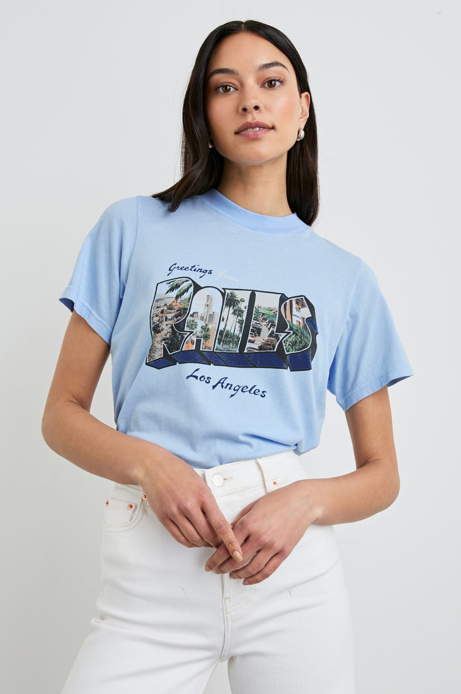 Boyfriend T-Shirt with a Crew Neck, photographs of Los Angeles and the text, Greetings From Rails Los Angeles in Rails Los Angeles Blue Colorway, with text in Blue and White - Front Tucked View Featured on Model