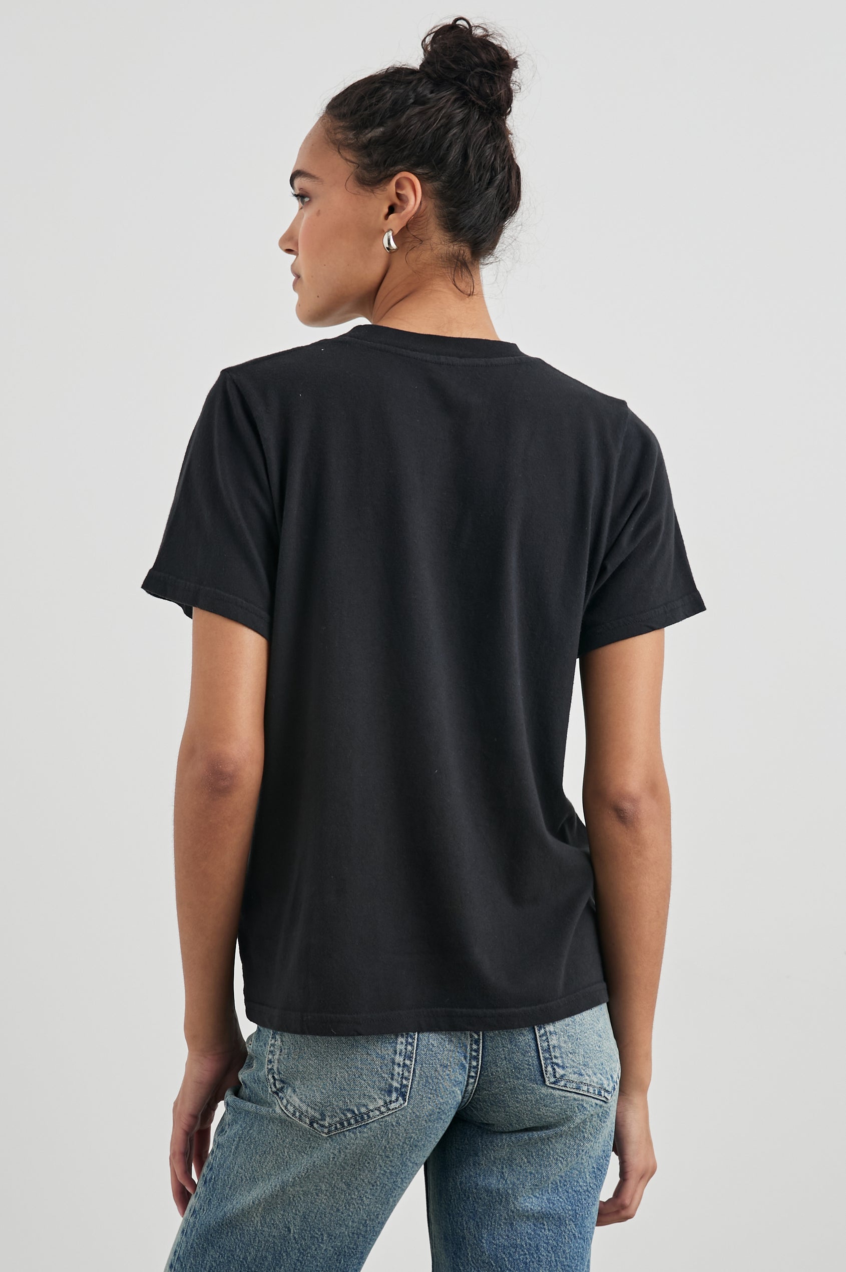 Boyfriend T-Shirt with a Crew Neck, New York images, and the text, Rails New York City, Hot and Fresh in Rails New York Colorway, with image and text in black browns, greens, pinks, white, blues on Black - Back View Featured on Model