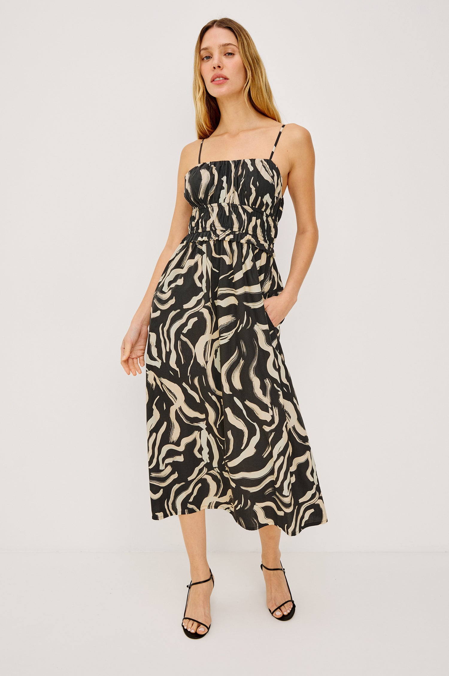 Breeze Midi Dress in Cotton Poplin With Adjustable Spaghetti Shoulder Straps, Gathered Bust, Smocked Waist, Side Pockets, and Full Skirt in Caicos Colorway - Full Body Front View Featured on Model