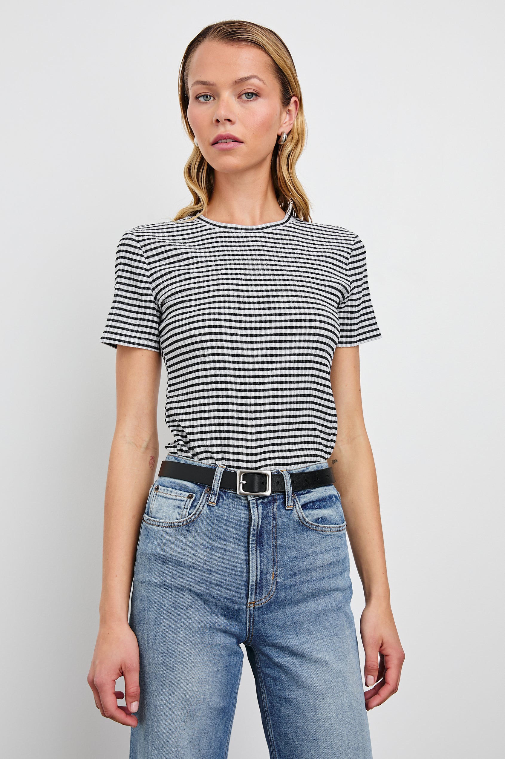 Britty Short-Sleeve Top with Crewneck in Black Gingham Colorway - Front Tucked View Featured on Model