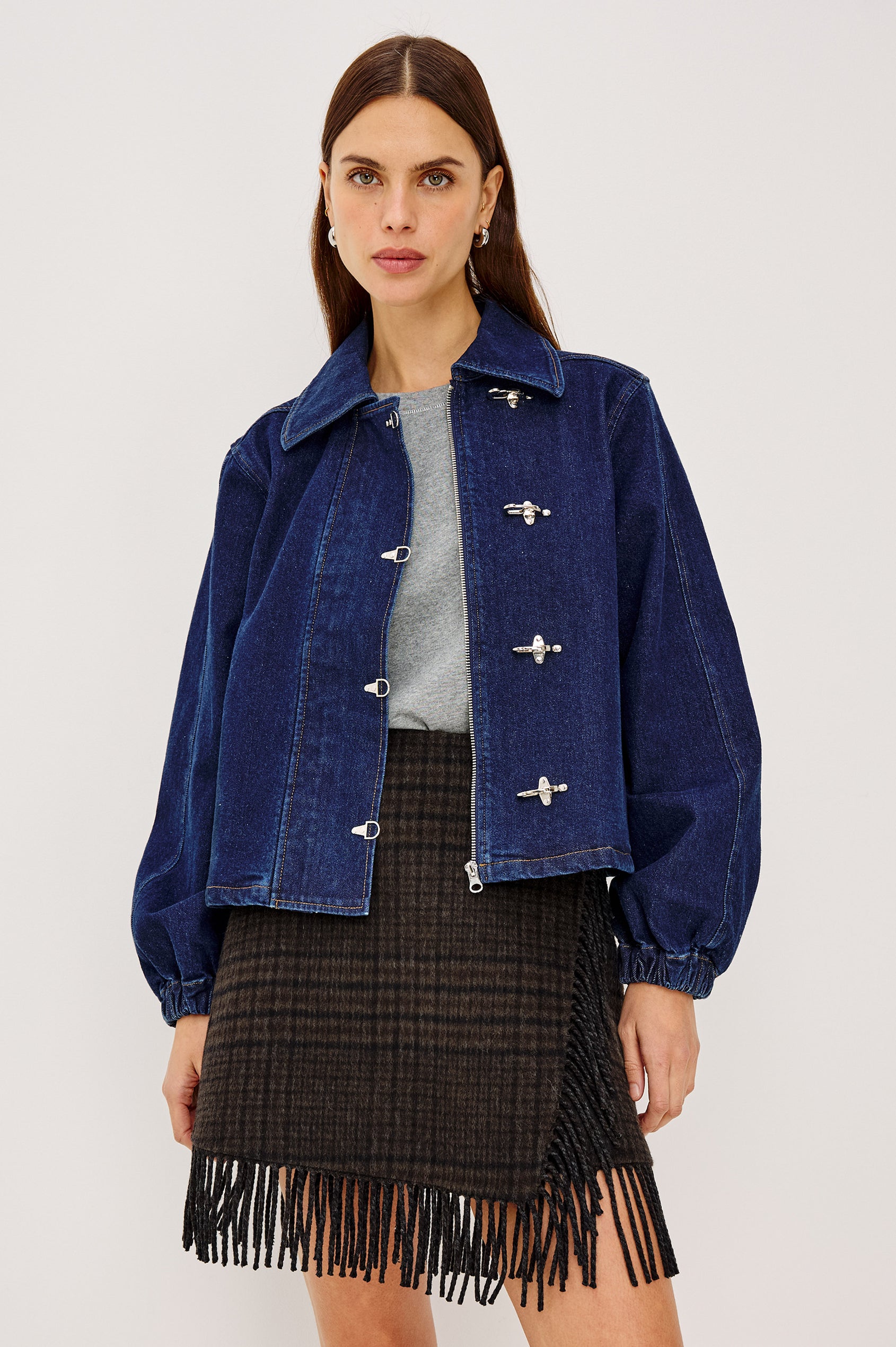 Brooke Jacket in Midweight Denim With Duffel Slightly Cropped Fit, Long Balloon Sleeves, Elastic Cuffs, Back Yoke Pleat, and Front Toggle Closures in Rinse Indigo Colorway - Upper Body Front View Featured on Model