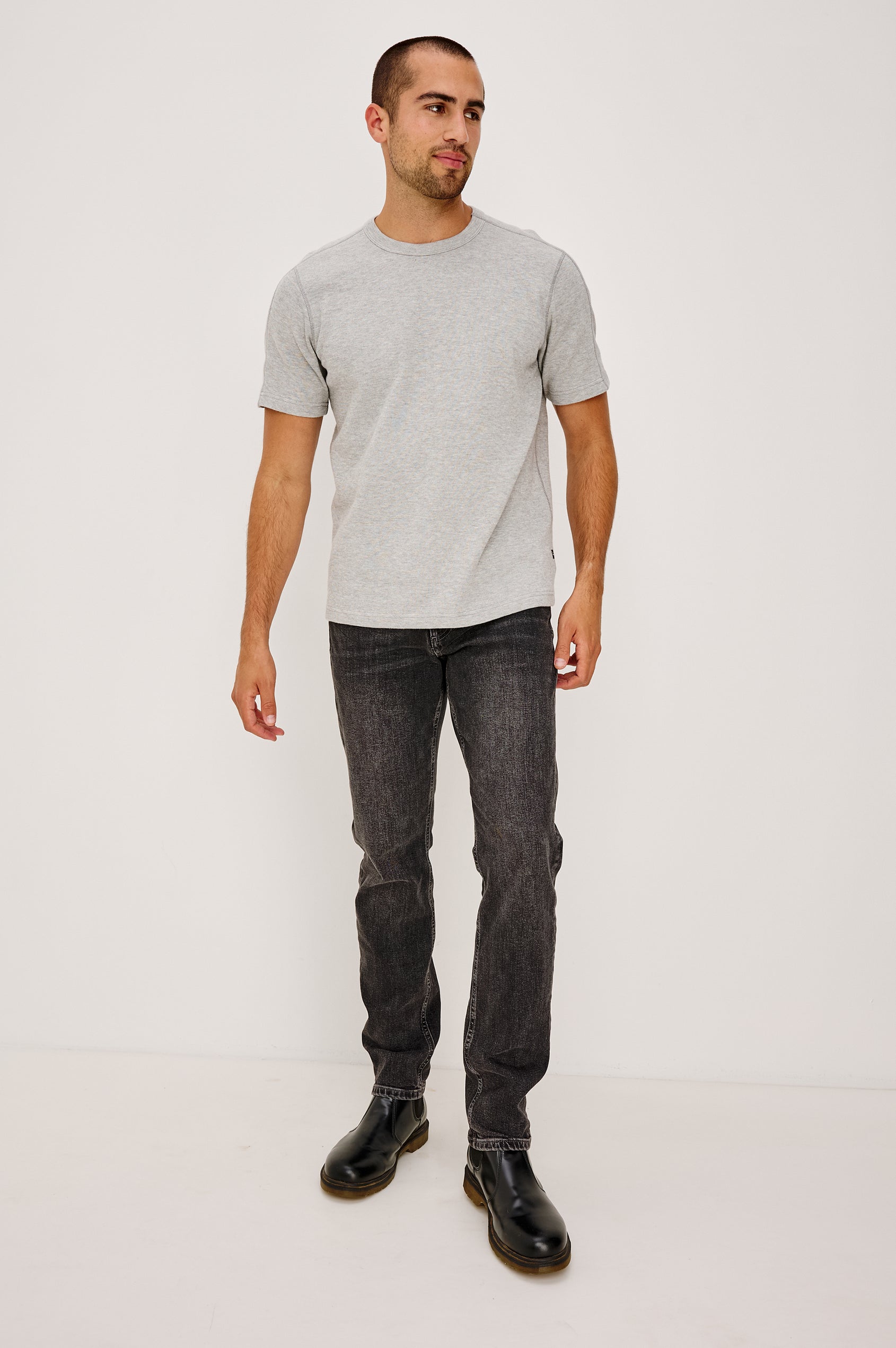 Brooks Short Sleeve T-Shirt With Crew Neckline, Short Sleeves, and Classic Fit in Washed Black Colorway - Full Body Front View Featured on Model