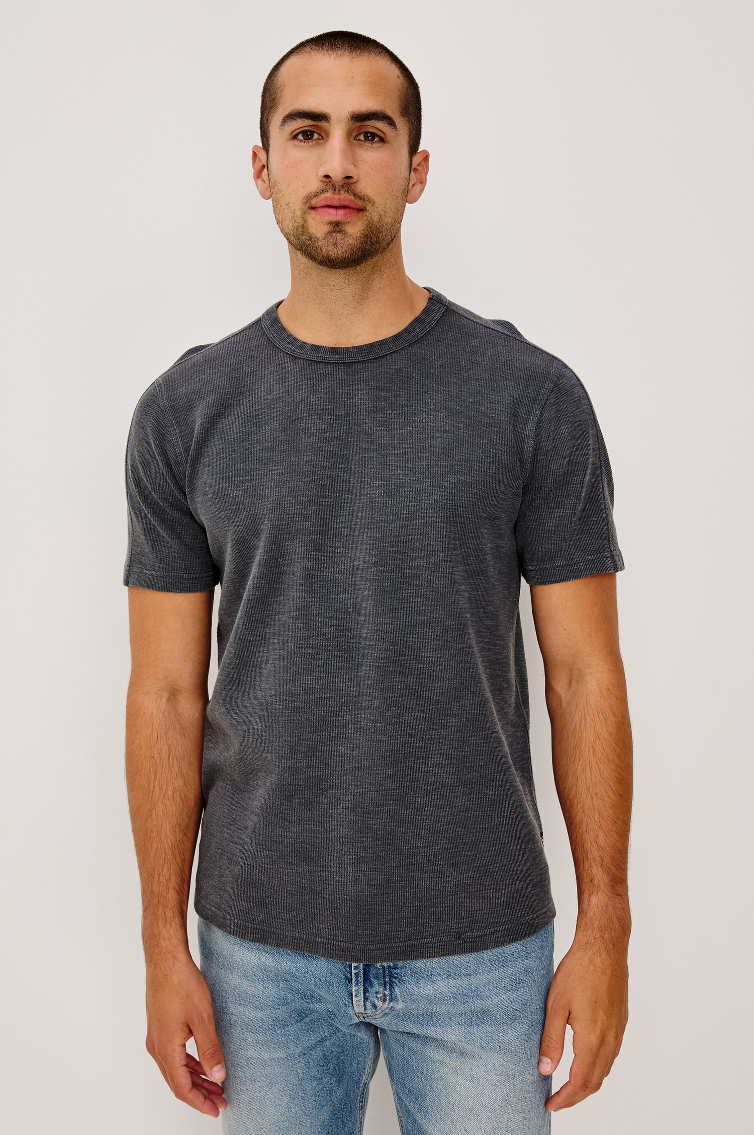 Brooks Short Sleeve T-Shirt With Crew Neckline, Short Sleeves, and Classic Fit in Washed Black Colorway - Upper Body Front View Featured on Model