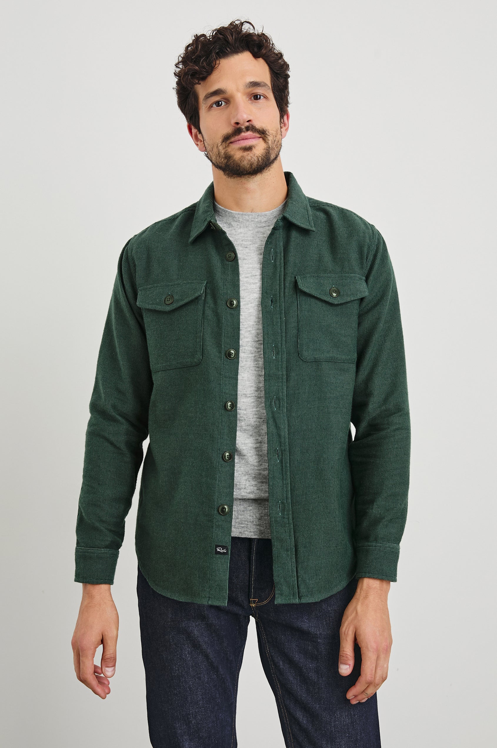 Burr Collared Shirt Jacket with Button Closure, Two Chest Button Flap Pockets and Textured Fabric in Creeping Vine Colorway, a Green - Front Unbuttoned View Featured on Model