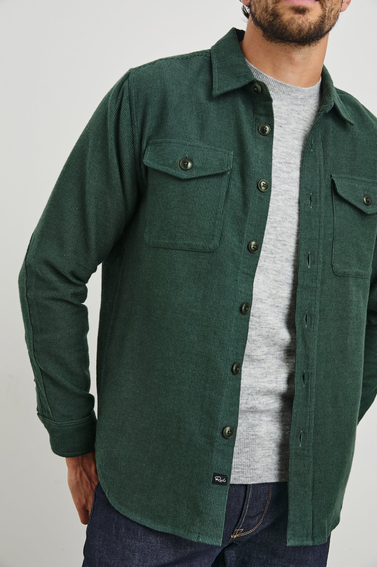 Men's Burr shirt jacket in Creeping Vine green, featuring a heavy-duty fabric and double chest pockets - front detail view featured on model.