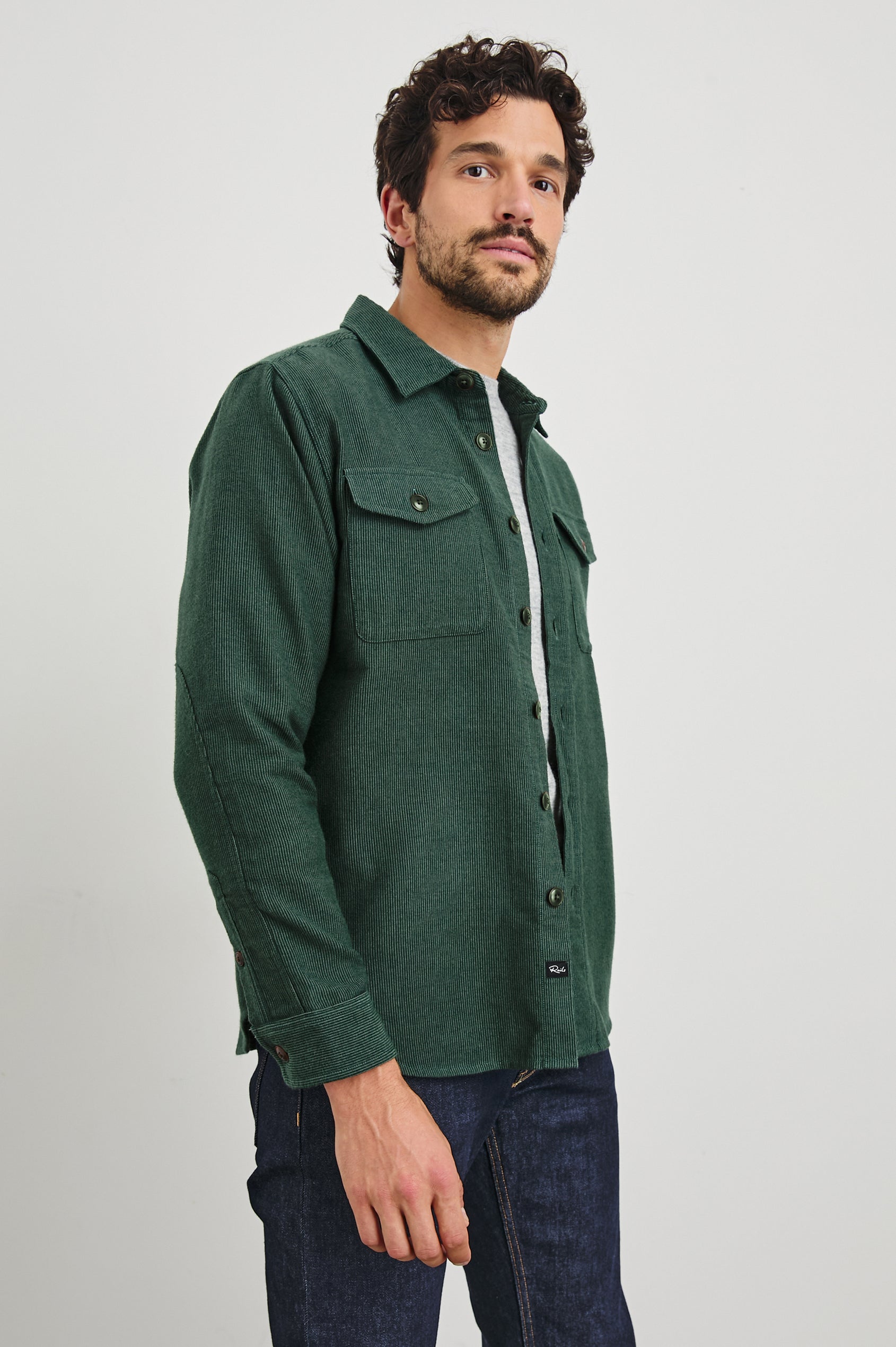 Burr Collared Shirt Jacket with Button Closure, Two Chest Button Flap Pockets and Textured Fabric in Creeping Vine Colorway, a Green - Front Unbuttoned View Featured on Model
