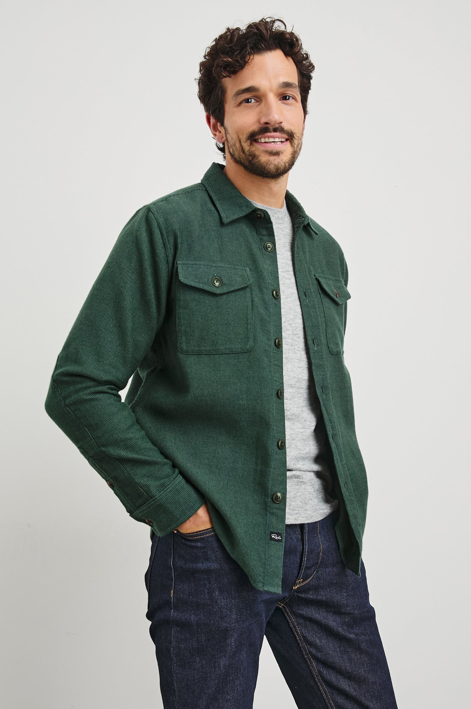 Burr Collared Shirt Jacket with Button Closure, Two Chest Button Flap Pockets and Textured Fabric in Creeping Vine Colorway, a Green - Front Unbuttoned View Featured on Model