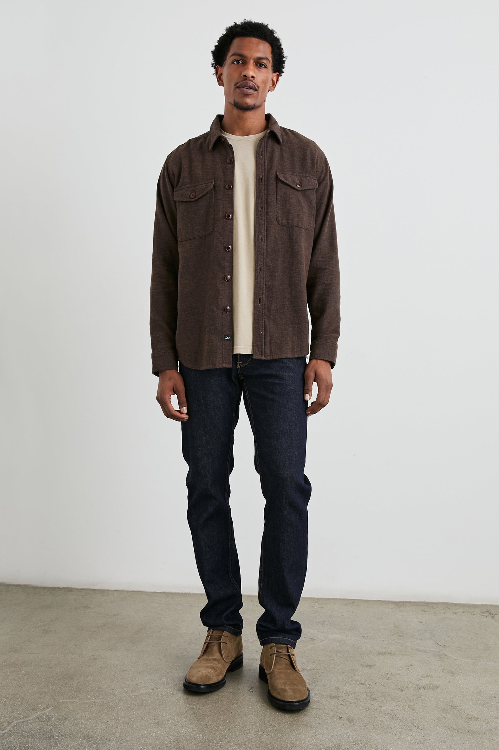 Burr Collared Shirt Jacket with Button Closure, Two Chest Button Flap Pockets and Textured Fabric in Pine Cone Colorway, a Brown - Front Full Body Unbuttoned View Featured on Model