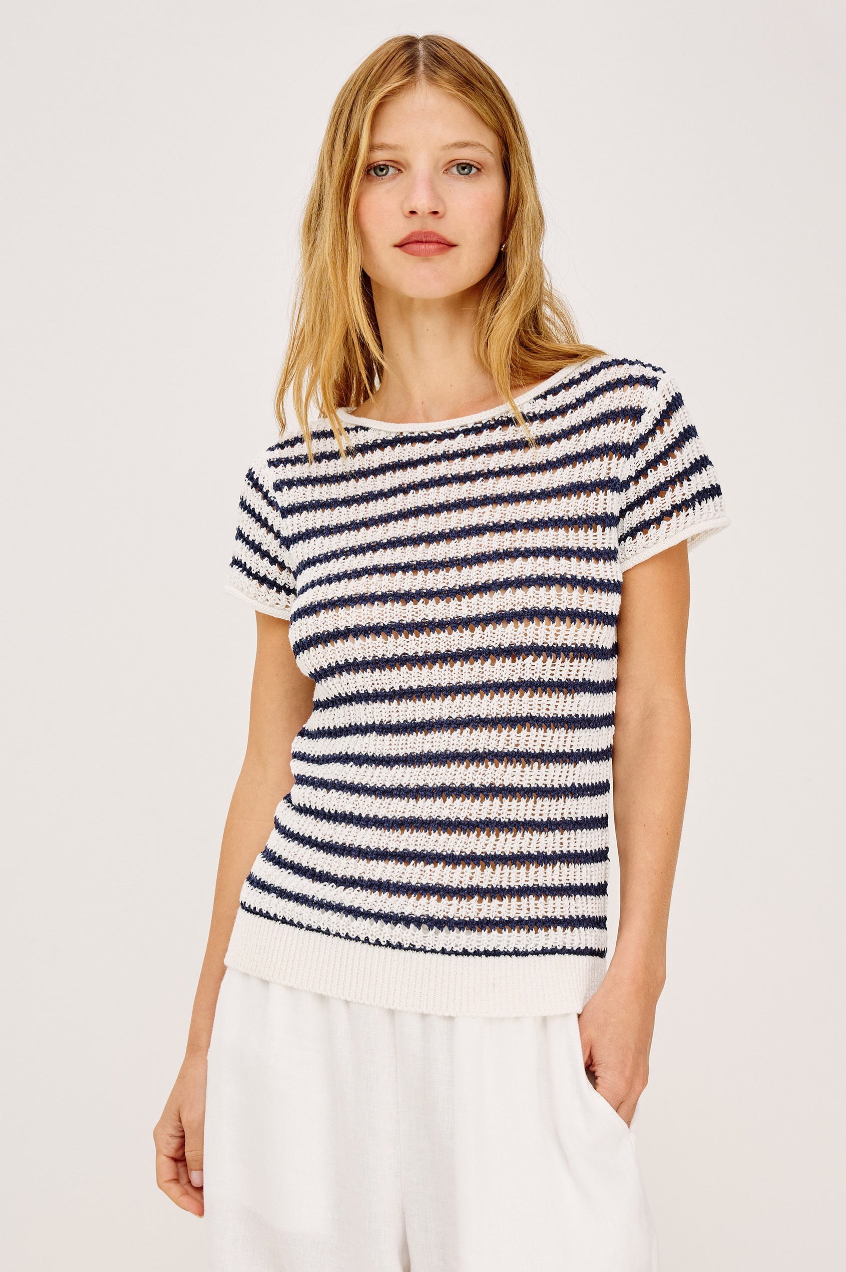 Cady Top in Semi-Sheer Linen-Blend Knit With Rolled Neckline, Cap Sleeves, and Classic Fit in Ivory Indigo Stripe Colorway - Upper Body Front View Featured on Model