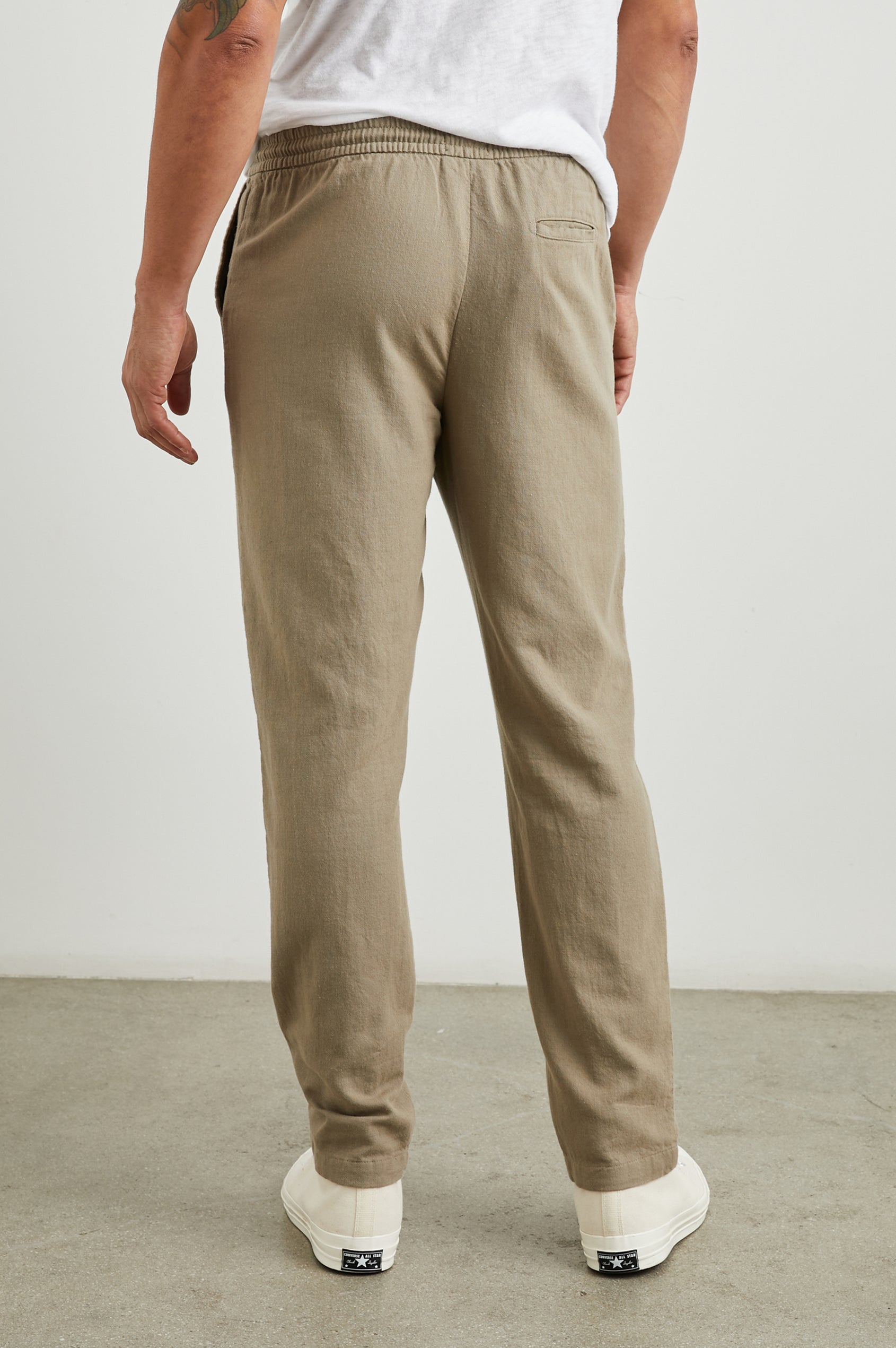 Callum Pants with a Drawstring Waist, Two Front Pockets and a Back Patch Pocket in Barley Colorway - Back View Featured on Model