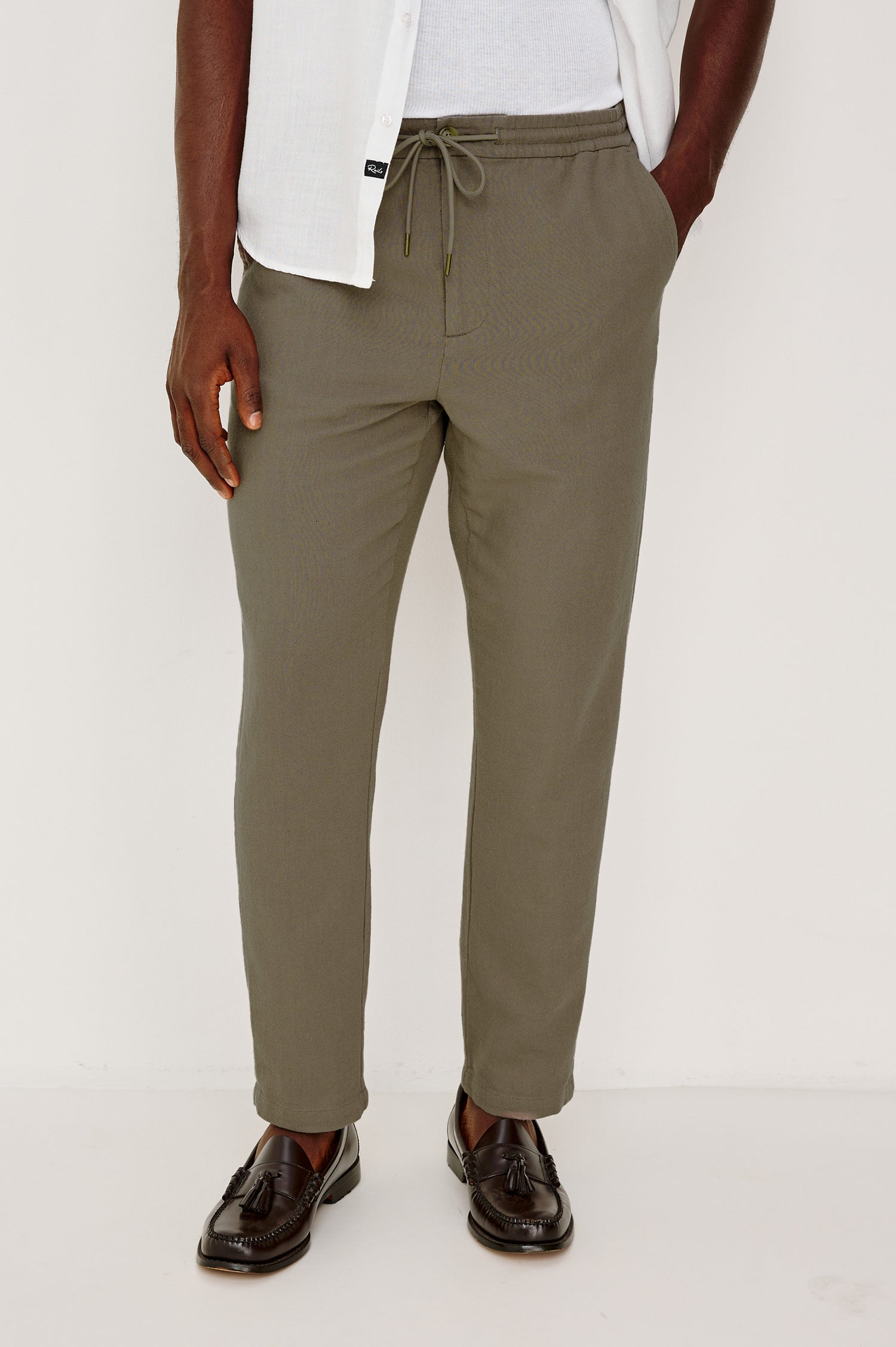 Callum Tapered Straight Leg Pant in Linen Twill With Adjustable Drawstring Waistband Ties in Fallen Rock Colorway - Lower Body Back View Featured on Model
