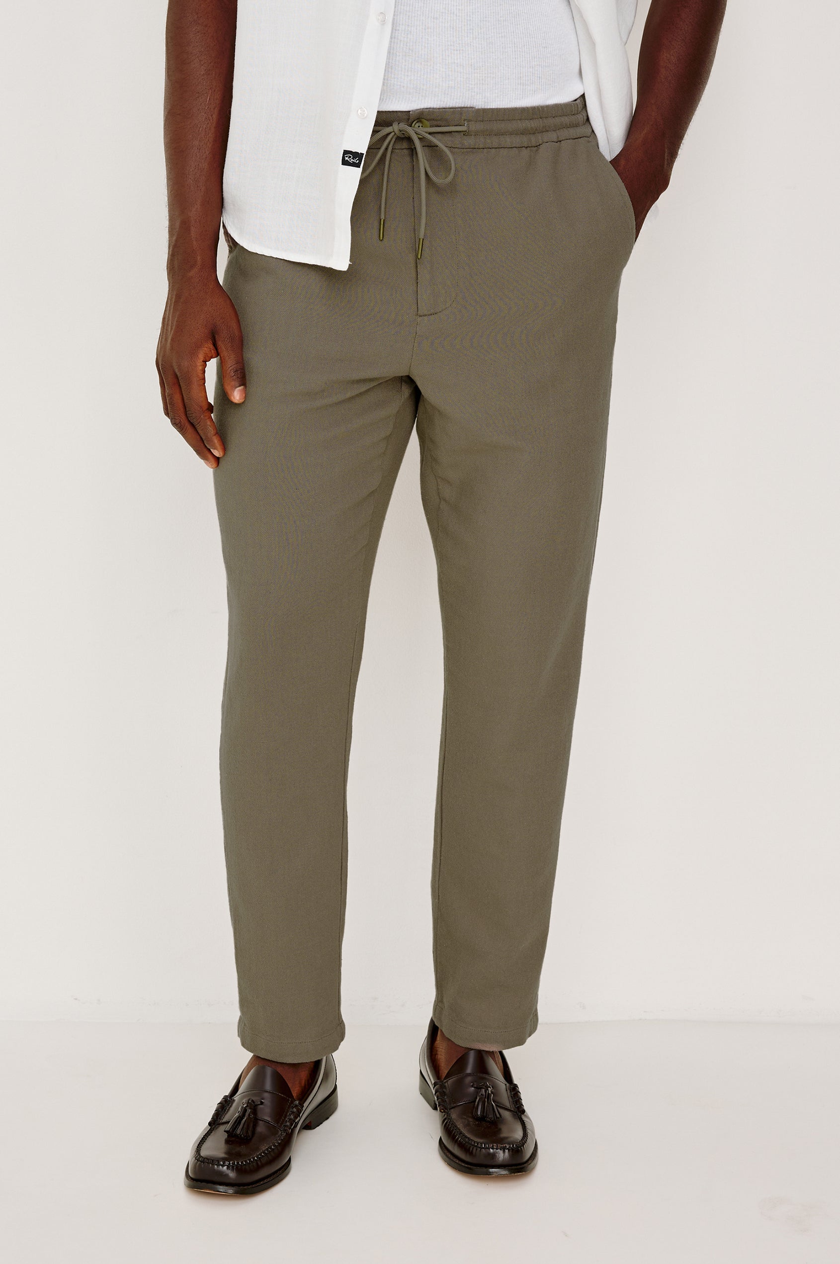 Callum Tapered Straight Leg Pant in Linen Twill With Adjustable Drawstring Waistband Ties in Fallen Rock Colorway - Lower Body Back View Featured on Model