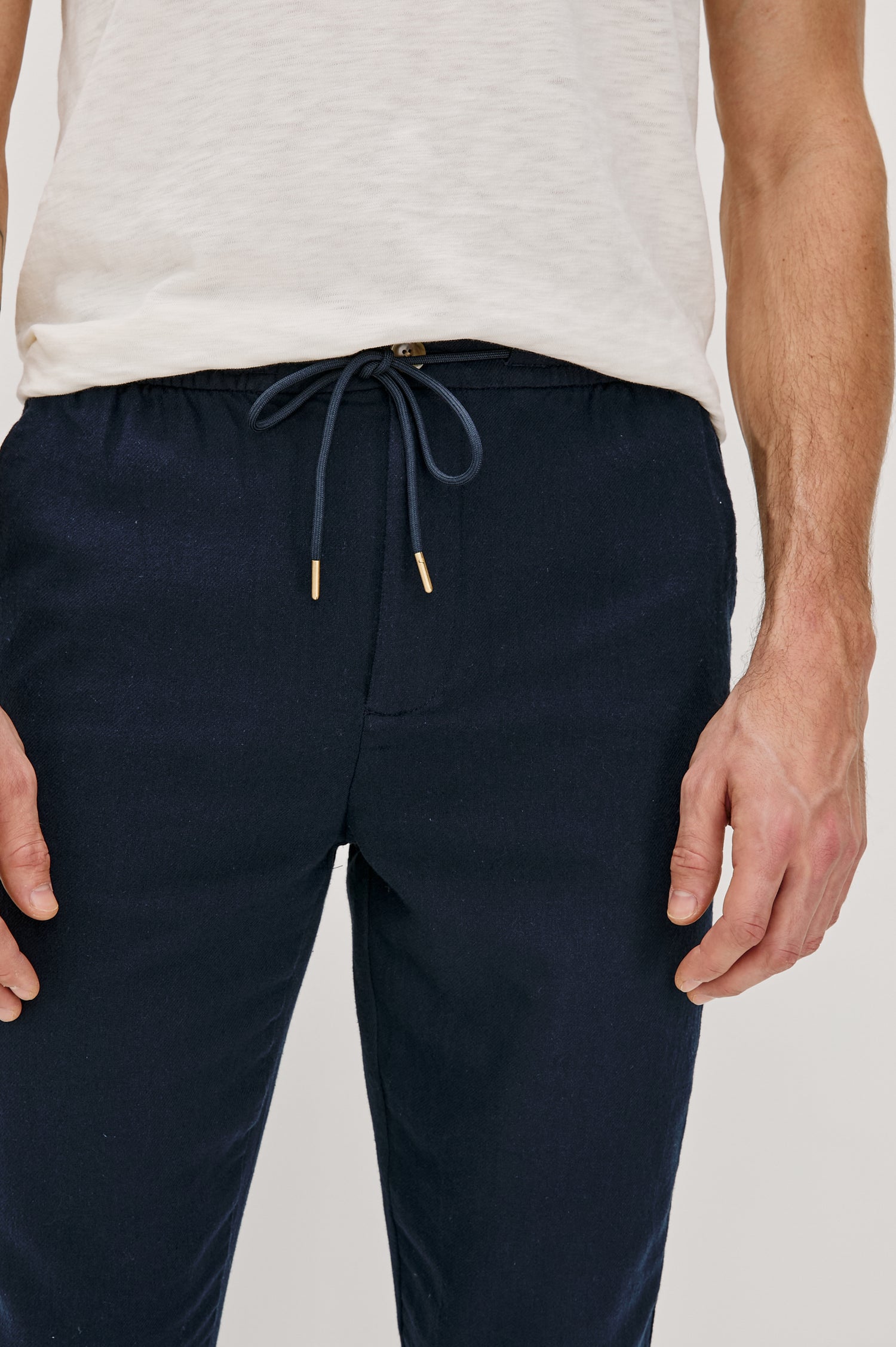 Callum extended length linen straight leg pant with elastic waistband and adjustable drawstring in Deep Meridian - close up of details on model